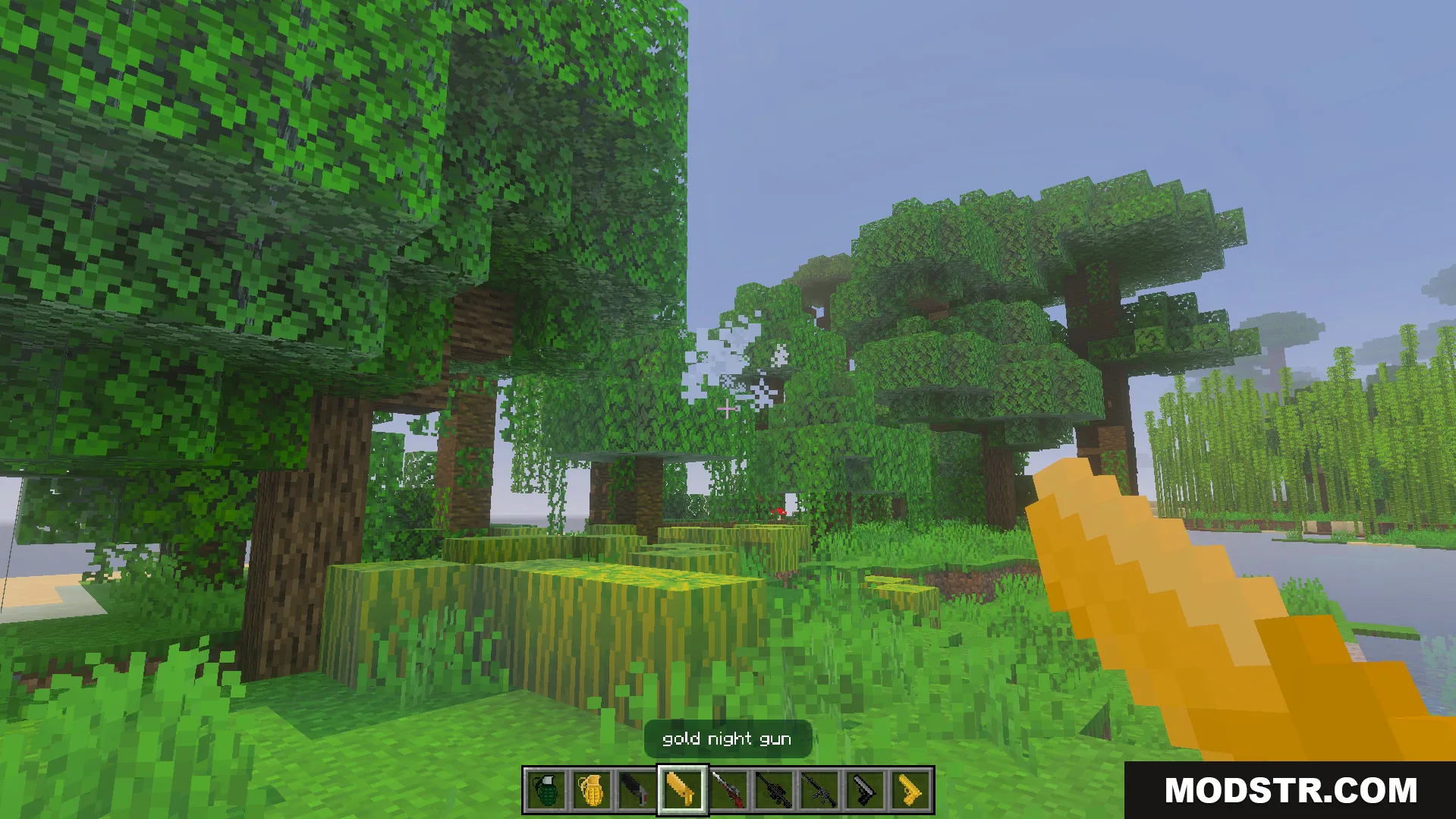 Gun Expansion Addon Screenshot 5 Player holding a gold night gun in a forest biome