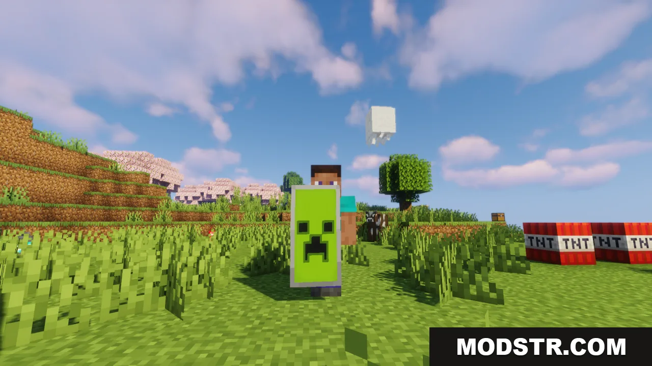 HD Shield Resource Pack Screenshot 12 A Minecraft player holding a shield with a detailed green Creeper design