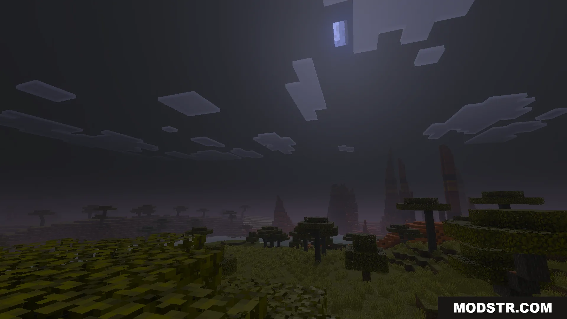 Dark night sky with clouds over a savanna landscape in Minecraft Bedrock