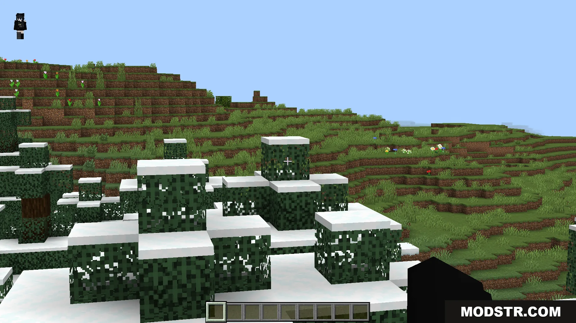 Just Zoom Addon Screenshot 3 Snow covered leaves on a grassy hill in a Minecraft world
