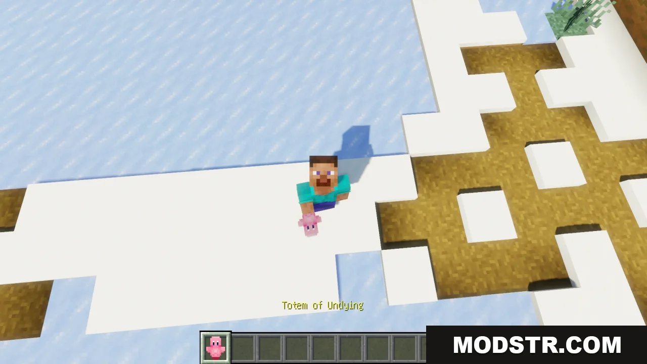 A Minecraft player holding a pink Kirby totem while standing on the snow