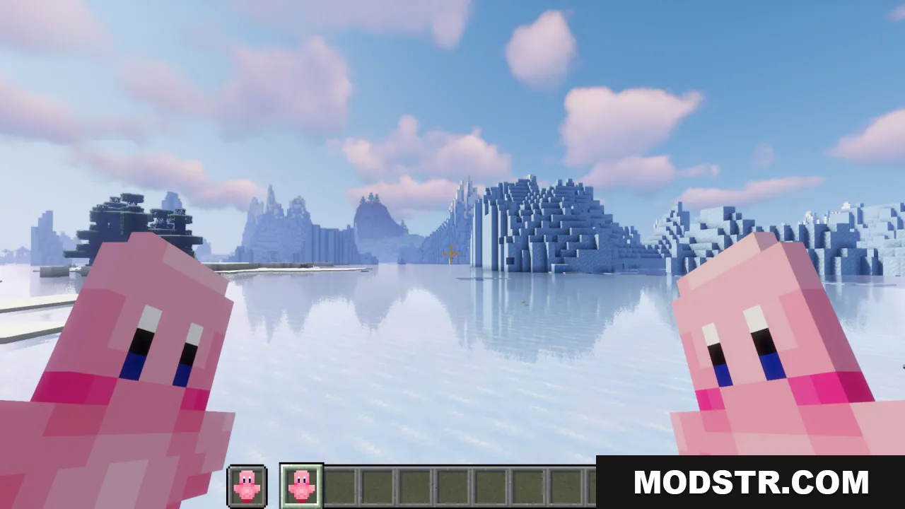 Player holding two pink Kirby Totems of Undying while standing in a frozen biome