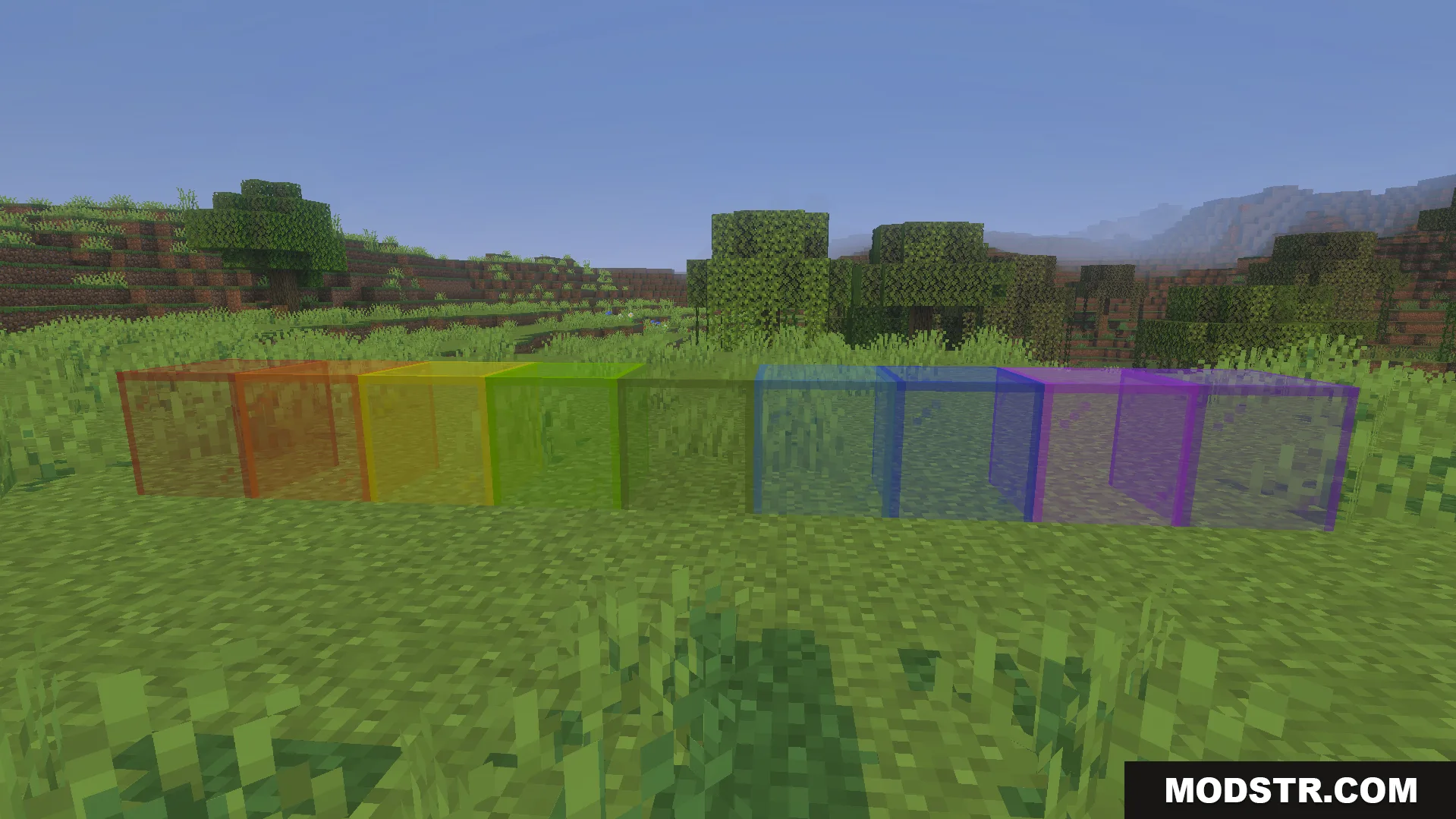KwZs Connected Glass Addon Screenshot 4 Various colored glass blocks connected together without lines in a grassy field