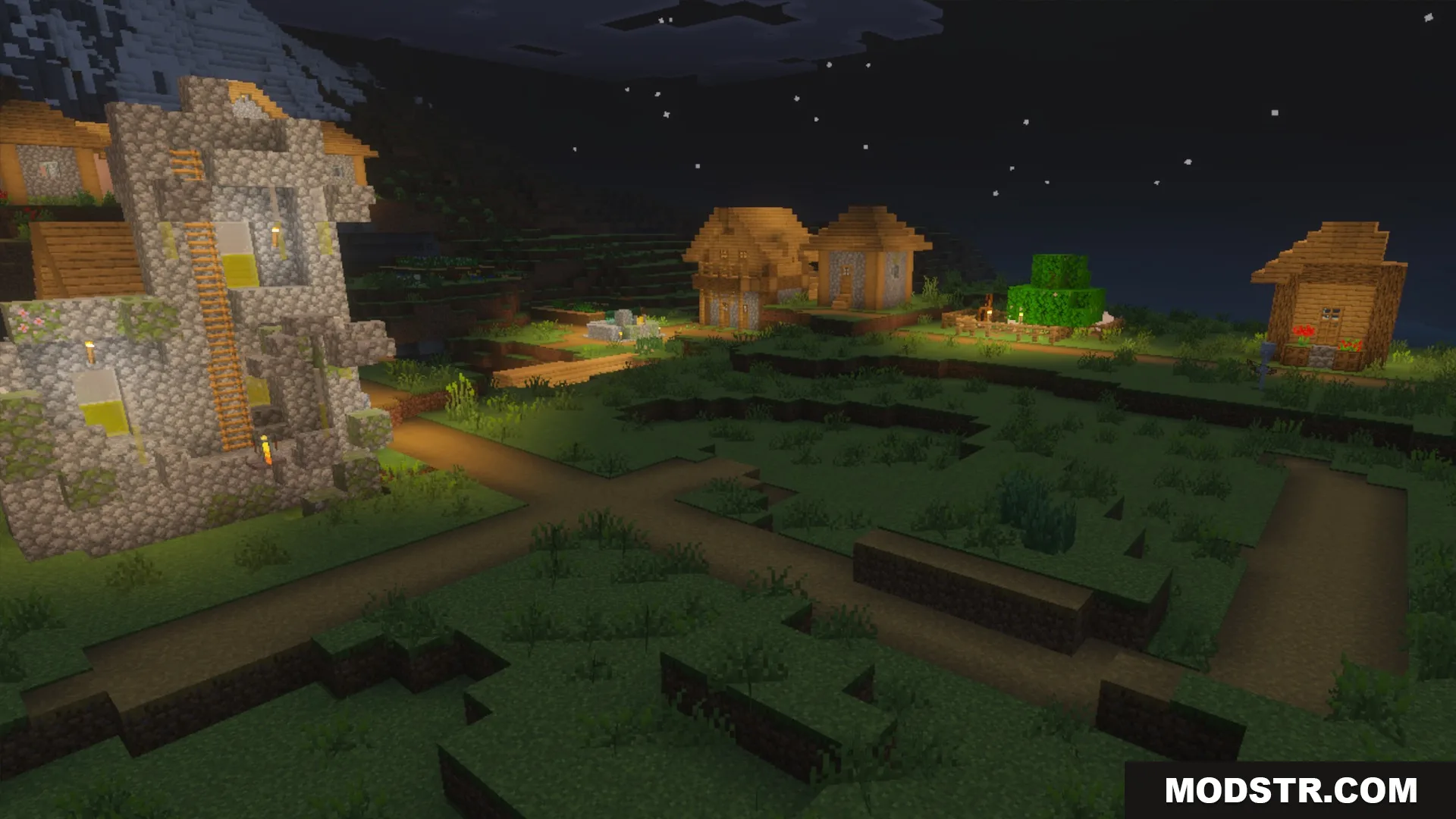 The village at night showing lighting and glowing blocks in the La Nature pack