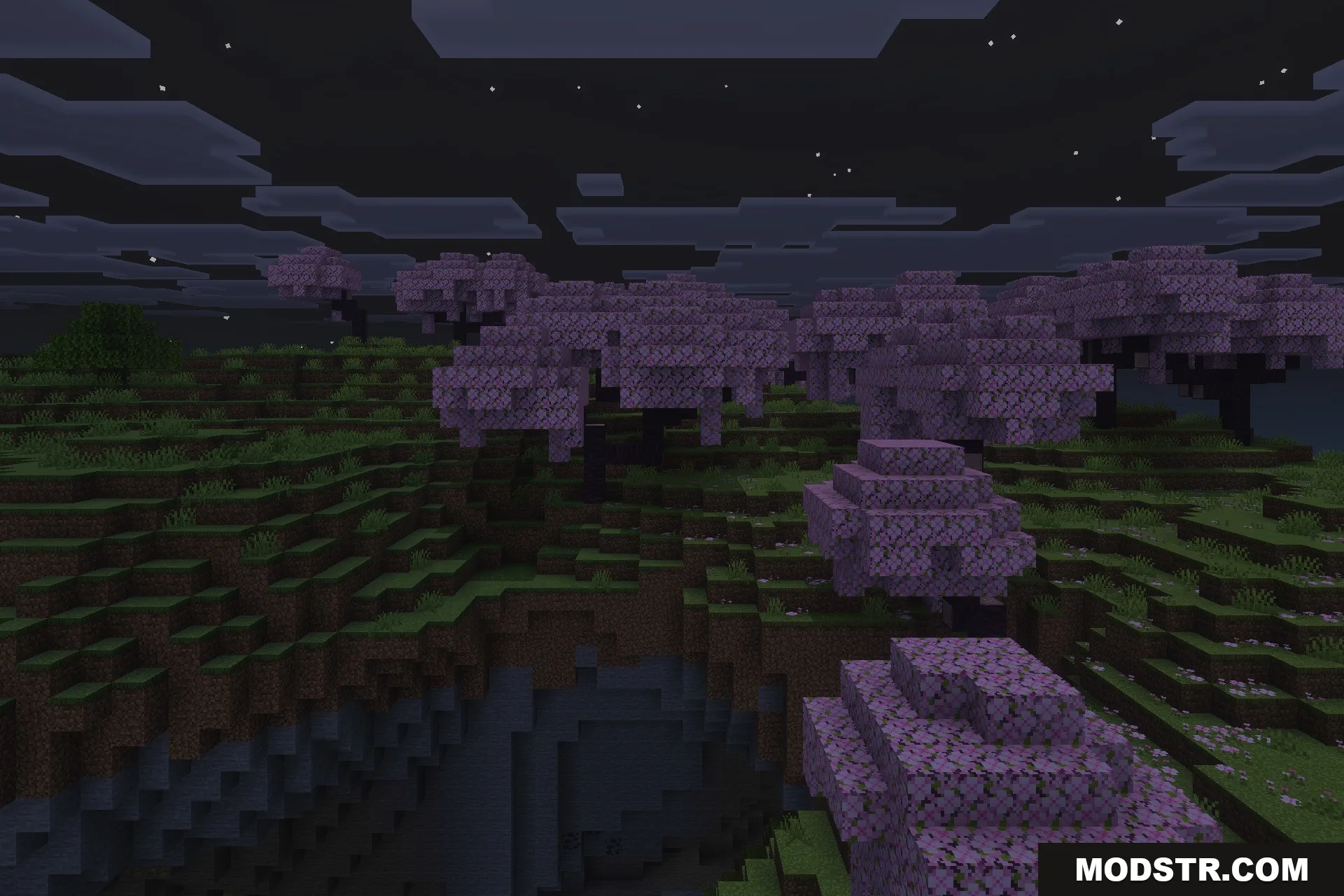 Lilium Dynamic Light Addon Screenshot 2 Pink cherry trees overlooking a dark cave entrance under the night sky
