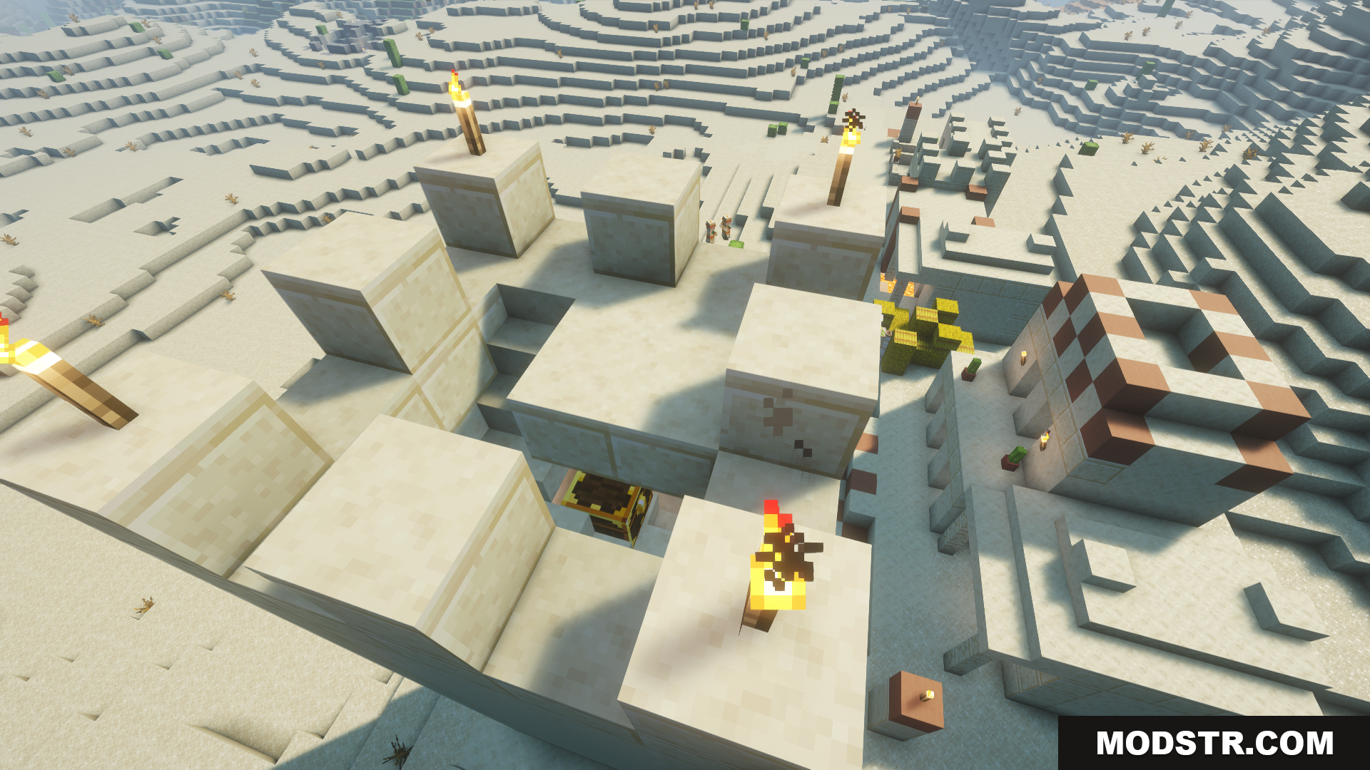 A desert structure with a hole leading to loot