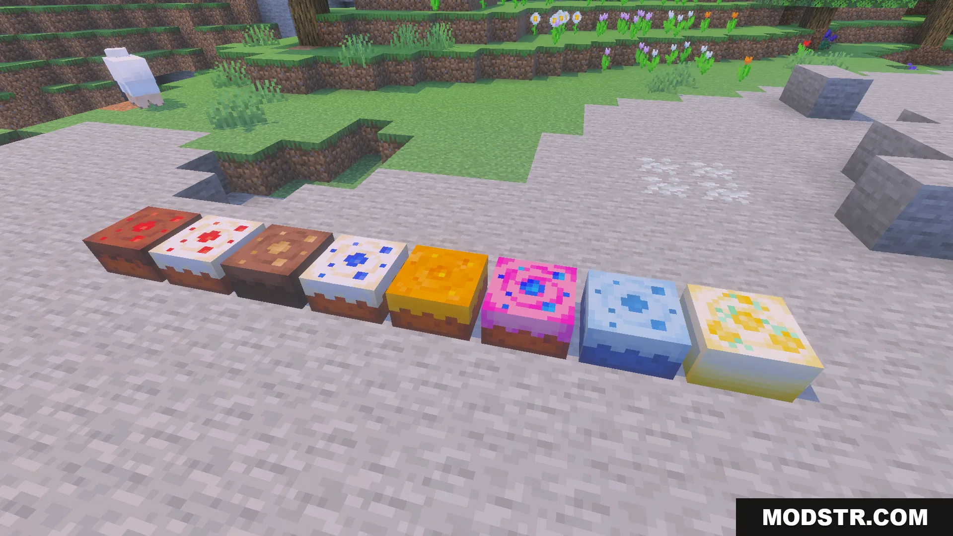 Loyallays Food Expansion Addon Screenshot 6 Several unique colorful cake blocks placed in a line on the ground