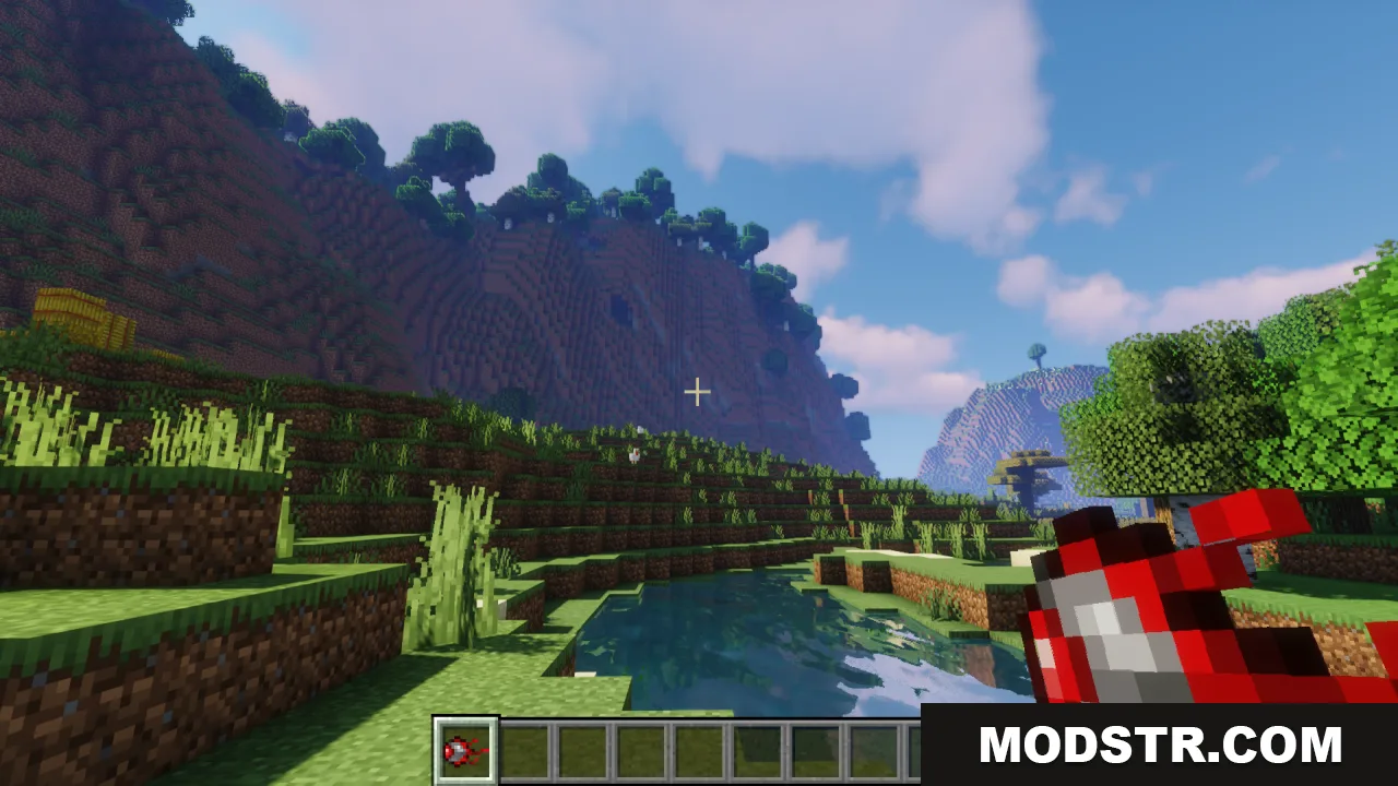 Mechanical Eye Resource Pack Screenshot 8 Player holding the Mechanical Eye item in a grassy landscape