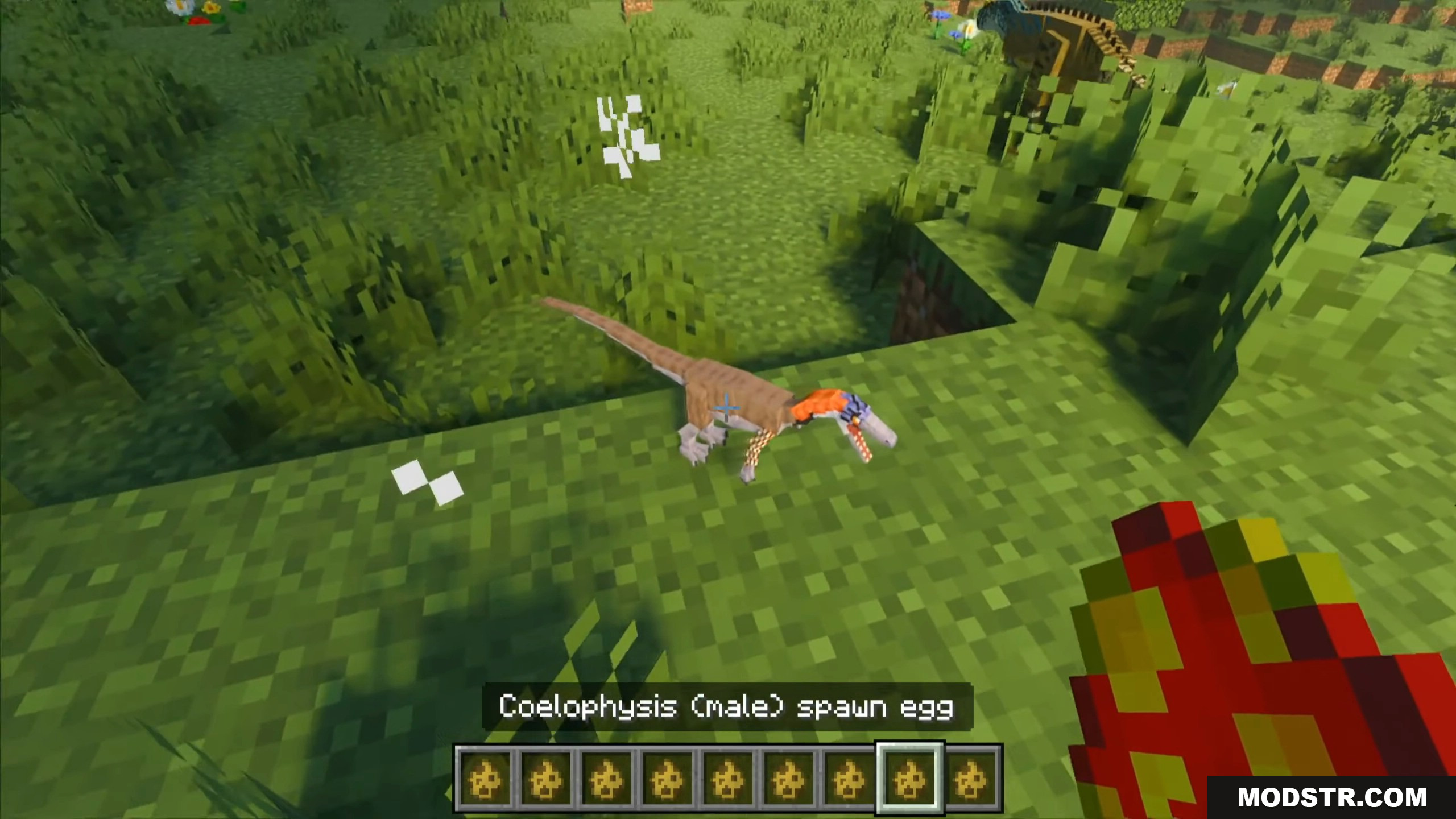 Mesozoic Biology Addon Screenshot 3 Player using a spawn egg to hatch small prehistoric dinosaur species