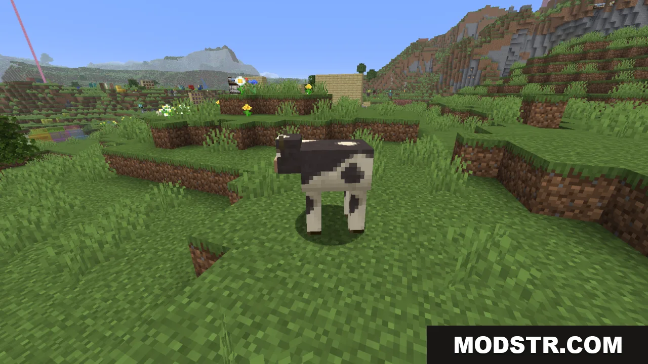 A black and white cow variant standing on a grassy hill in Minecraft