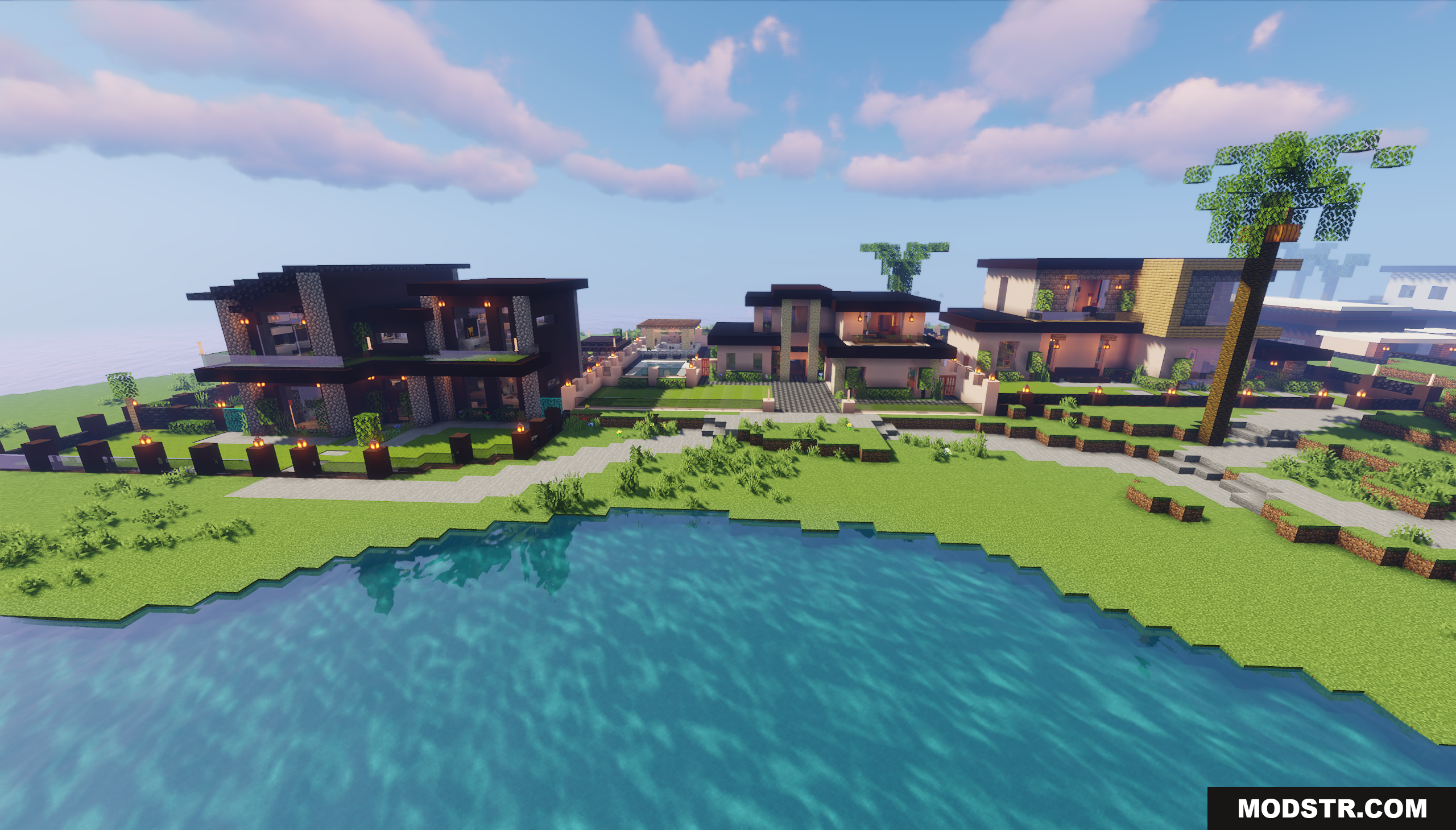 Row of modern luxury houses with large windows near the water