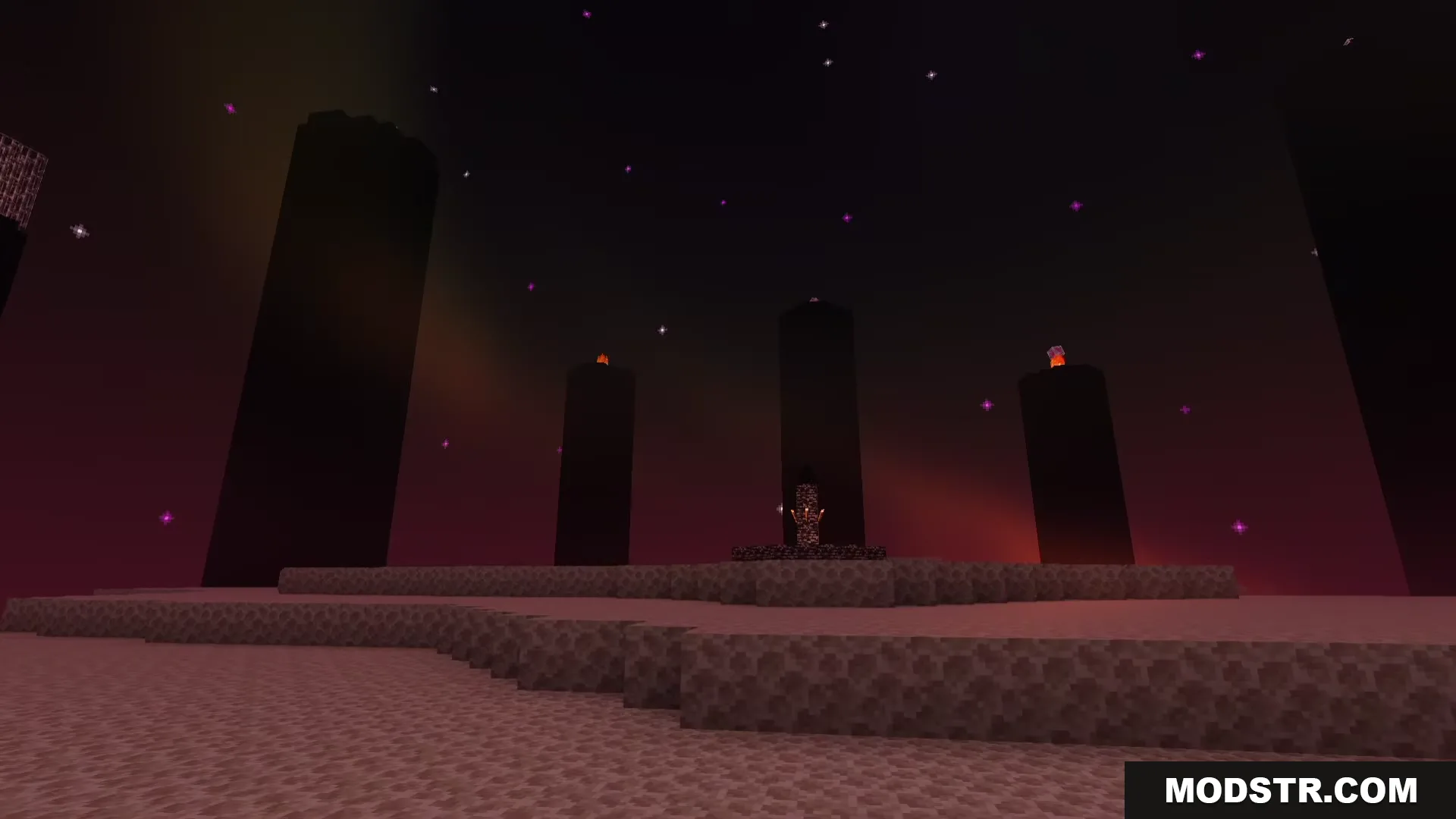 Obsidian pillars and end stone terrain under a dark purple sky