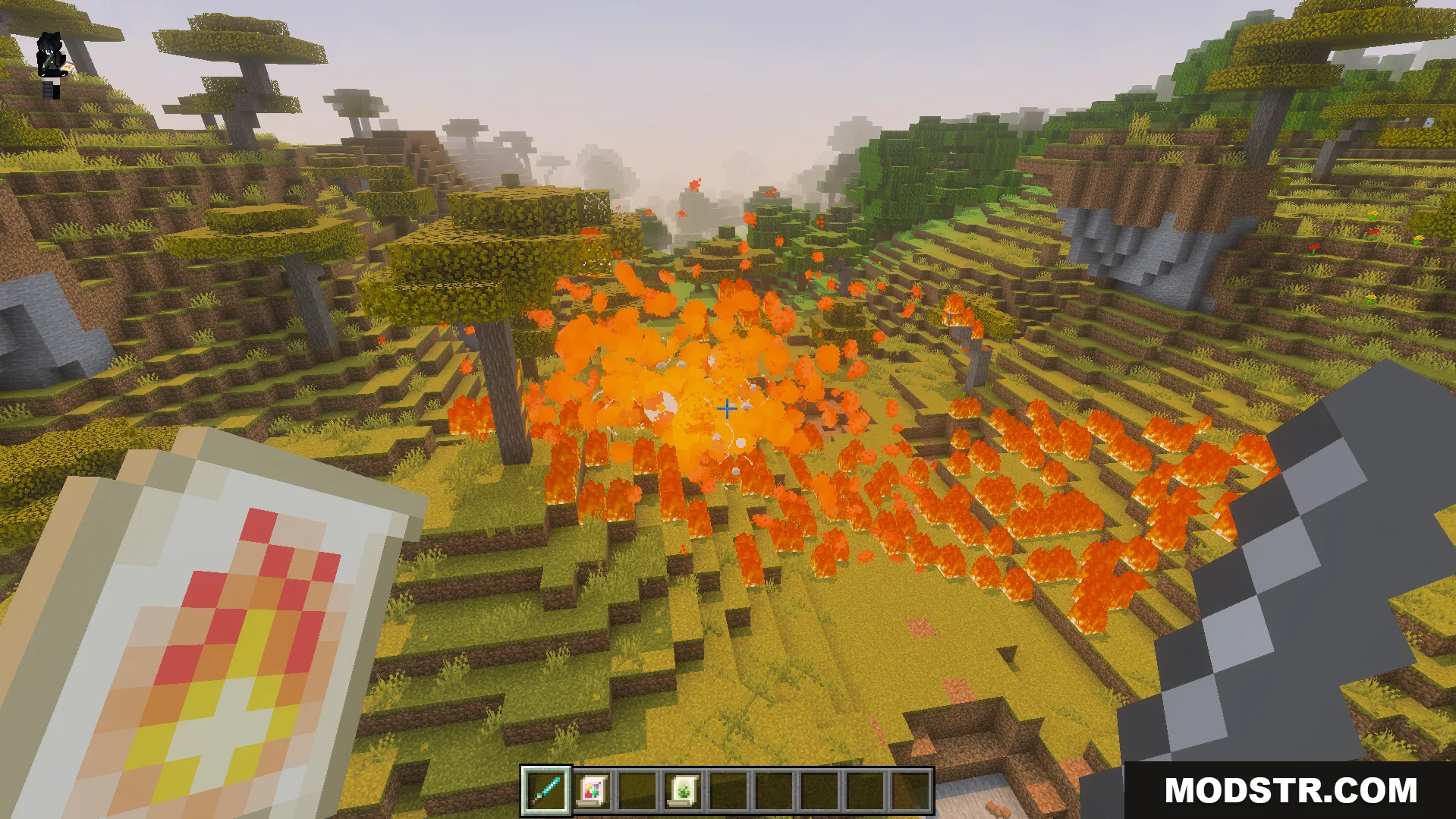 Large fire explosion triggered by a magic scroll in a savanna biome