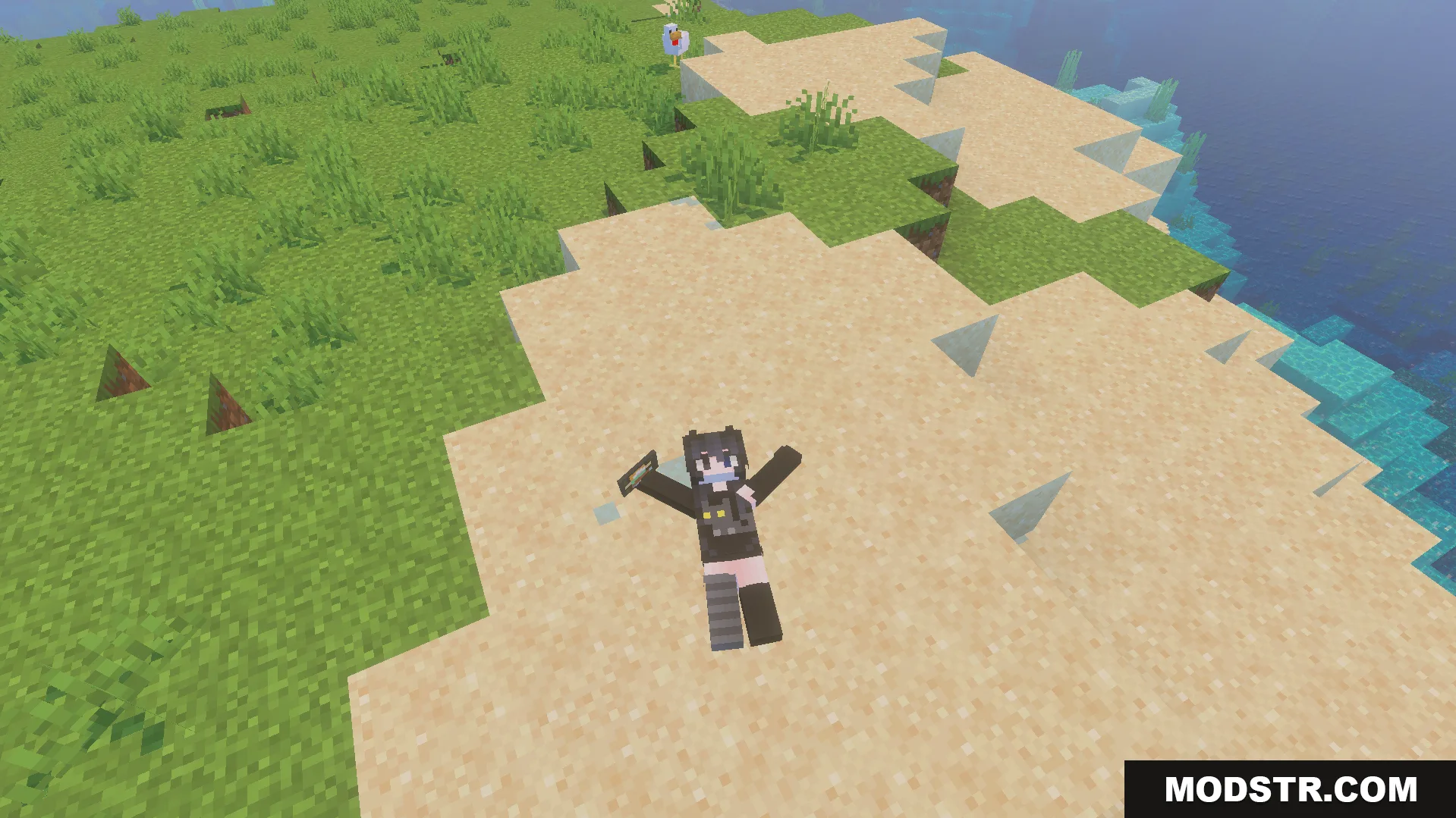 Not Enough Emotes Addon Screenshot 6 A Minecraft character performing a snow angel animation on a sandy beach
