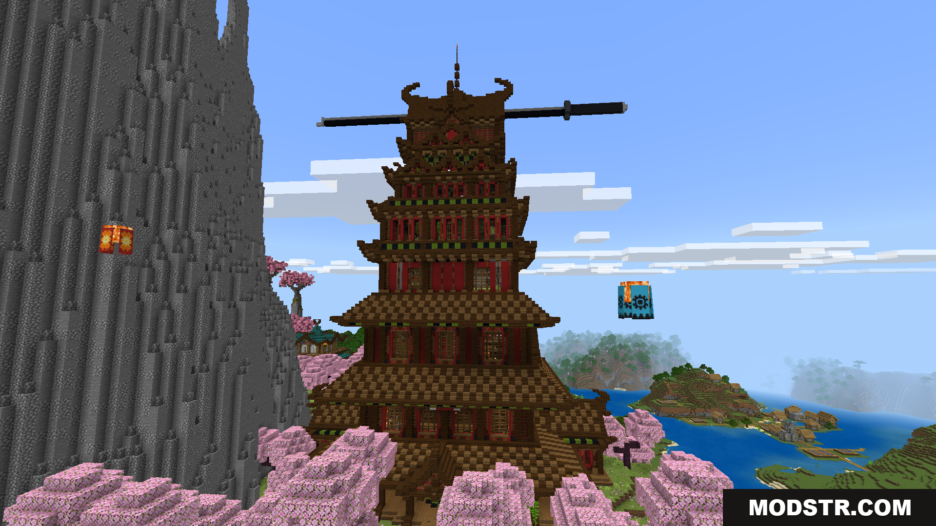 A tall traditional pagoda stands in an old Japanese town