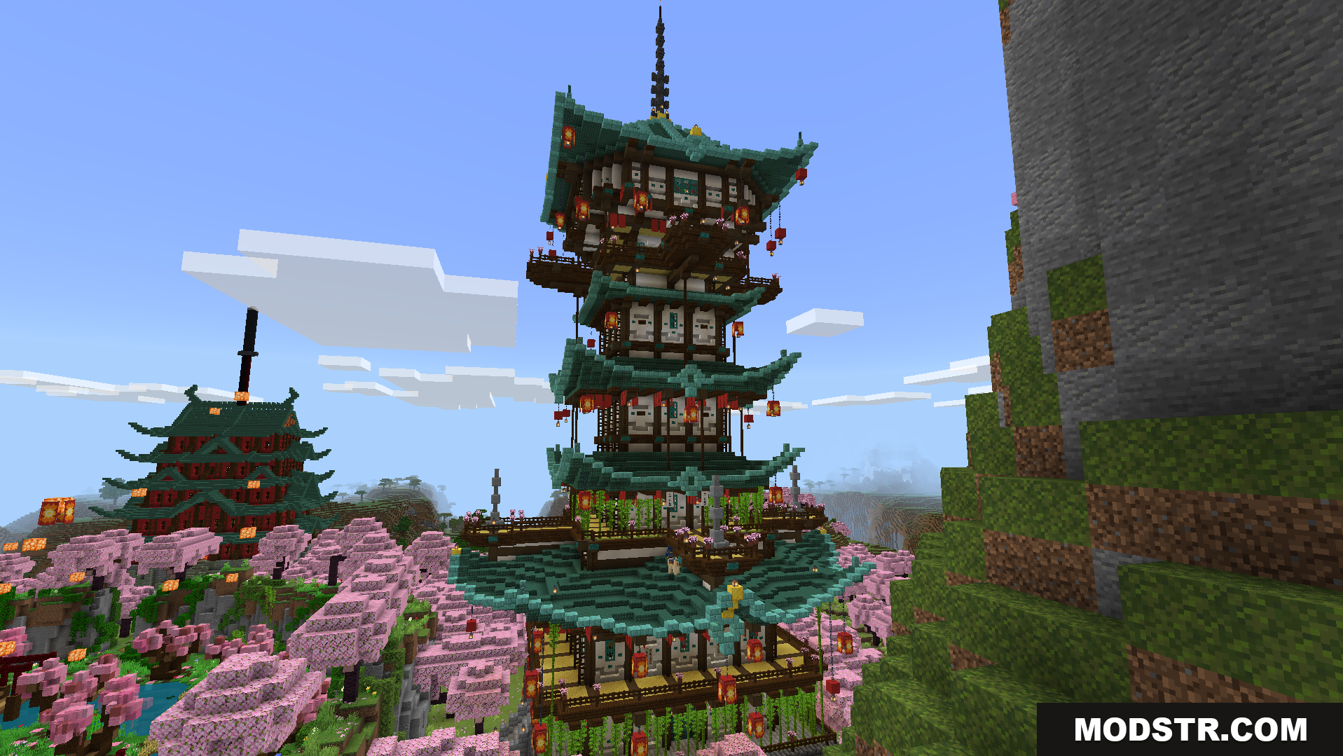 Explore a tall traditional pagoda surrounded by pink cherry trees