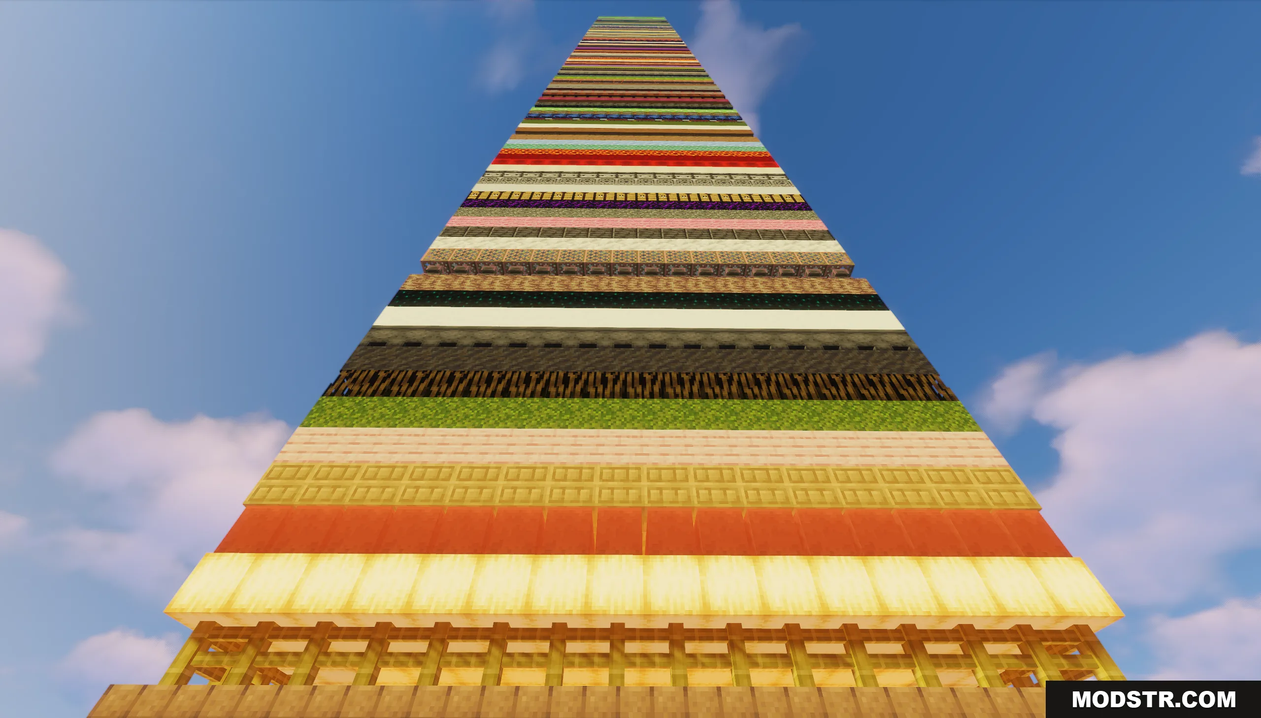 Looking up at a tall chunk pillar made of random horizontal block layers