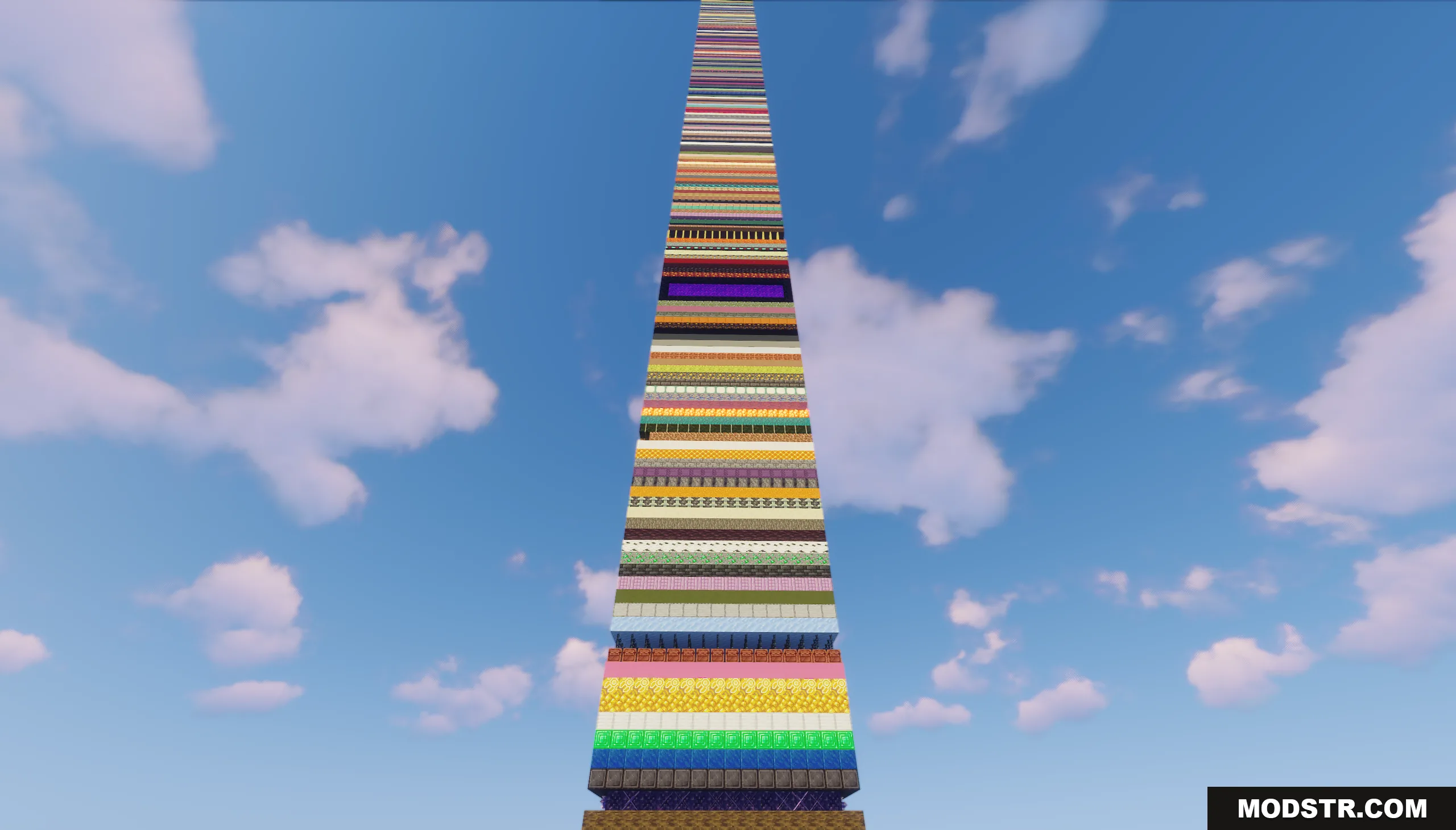 Wide view of an extremely tall single chunk tower built from random blocks