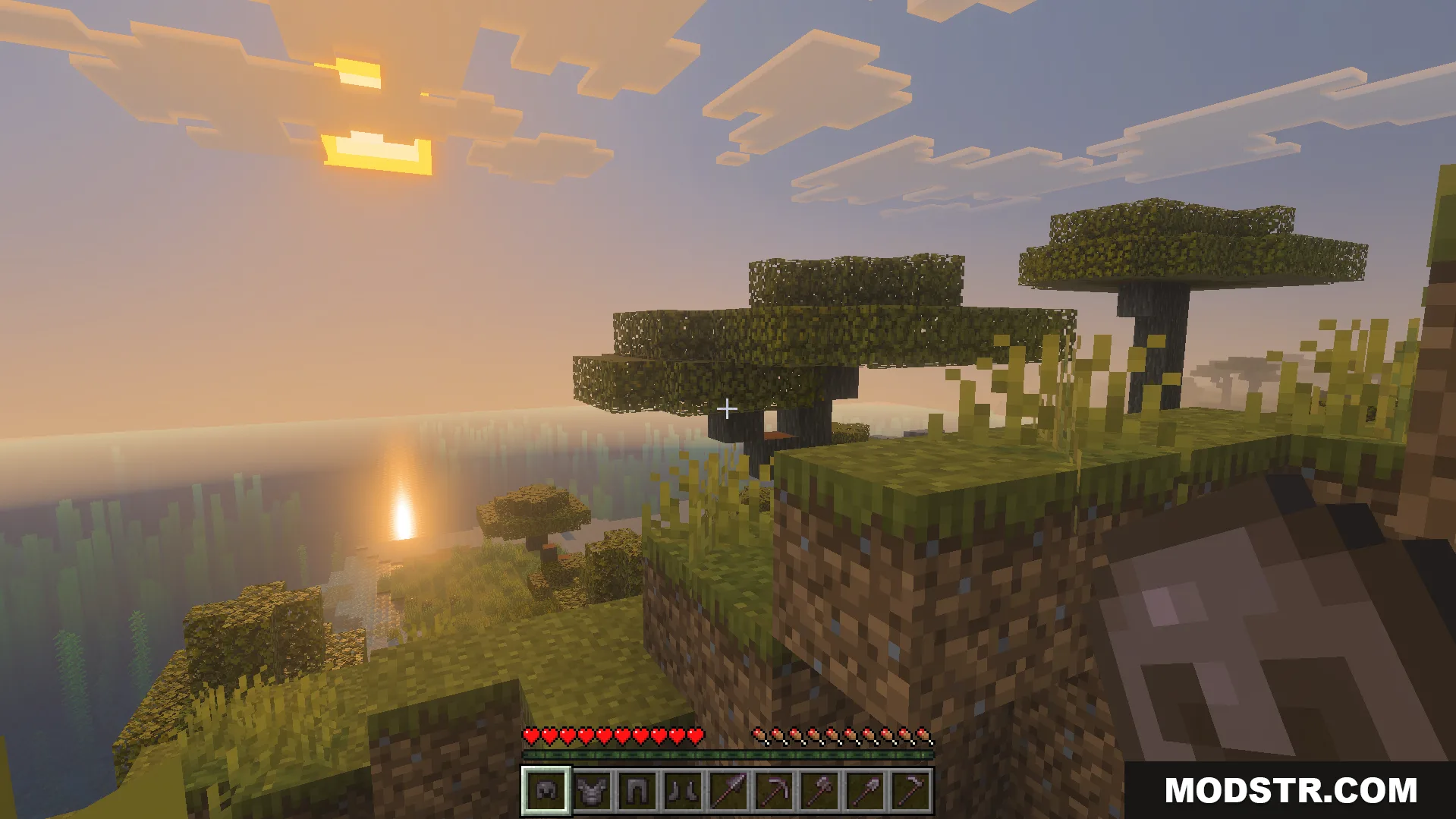 OP Loot Kit Addon Screenshot 2 Player holding netherite gear with a hotbar full of powerful survival tools