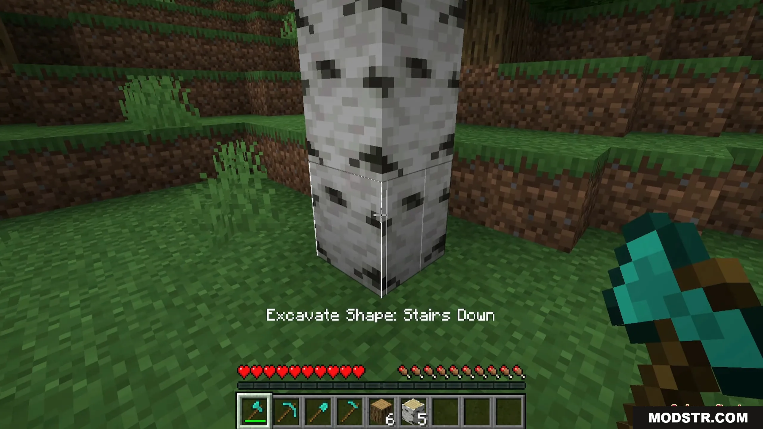 Ore Excavation 9minecraft Mod Screenshot 7 A player uses a diamond axe to select the stairs down excavation shape