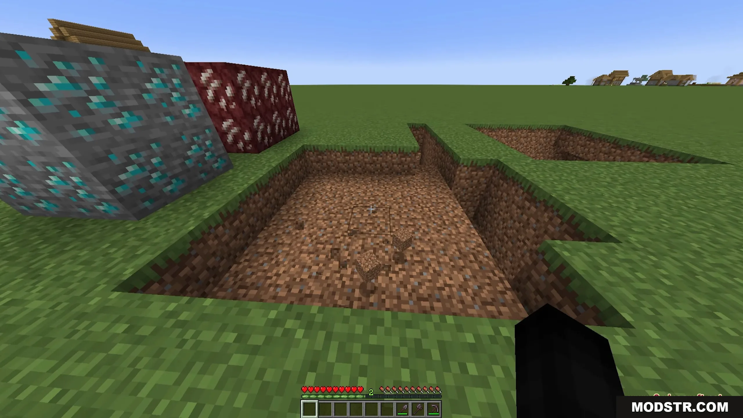 Ore Excavation 9minecraft Mod Screenshot 13 A player stands next to a large excavated pit and ore blocks