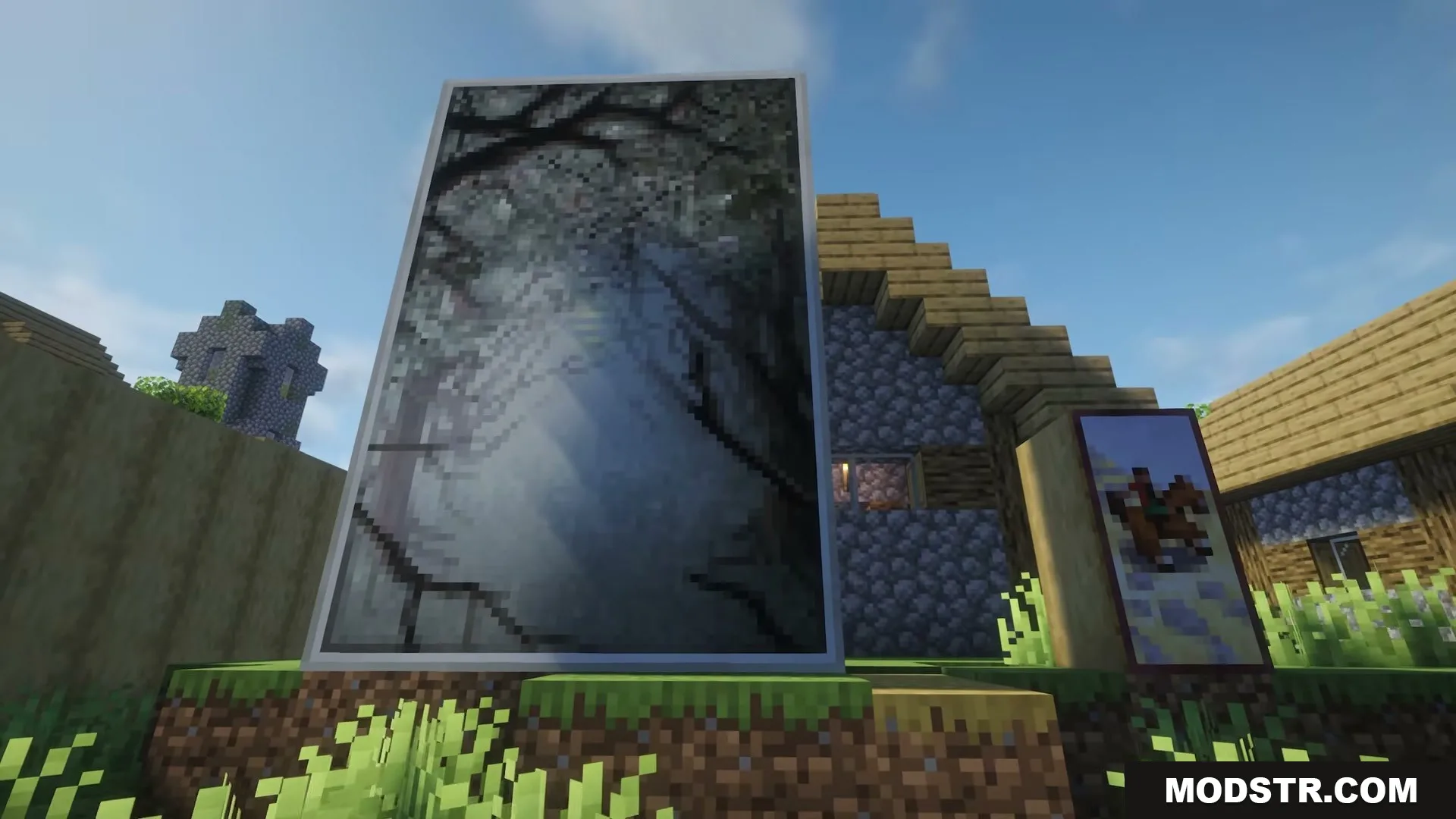 A large vertical landscape painting and a smaller horse painting in Minecraft