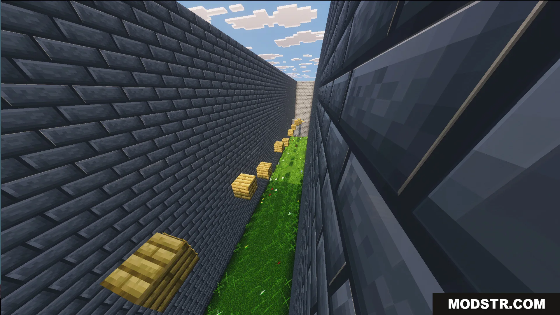 Easy jumps inside a narrow stone brick corridor with floating wooden blocks