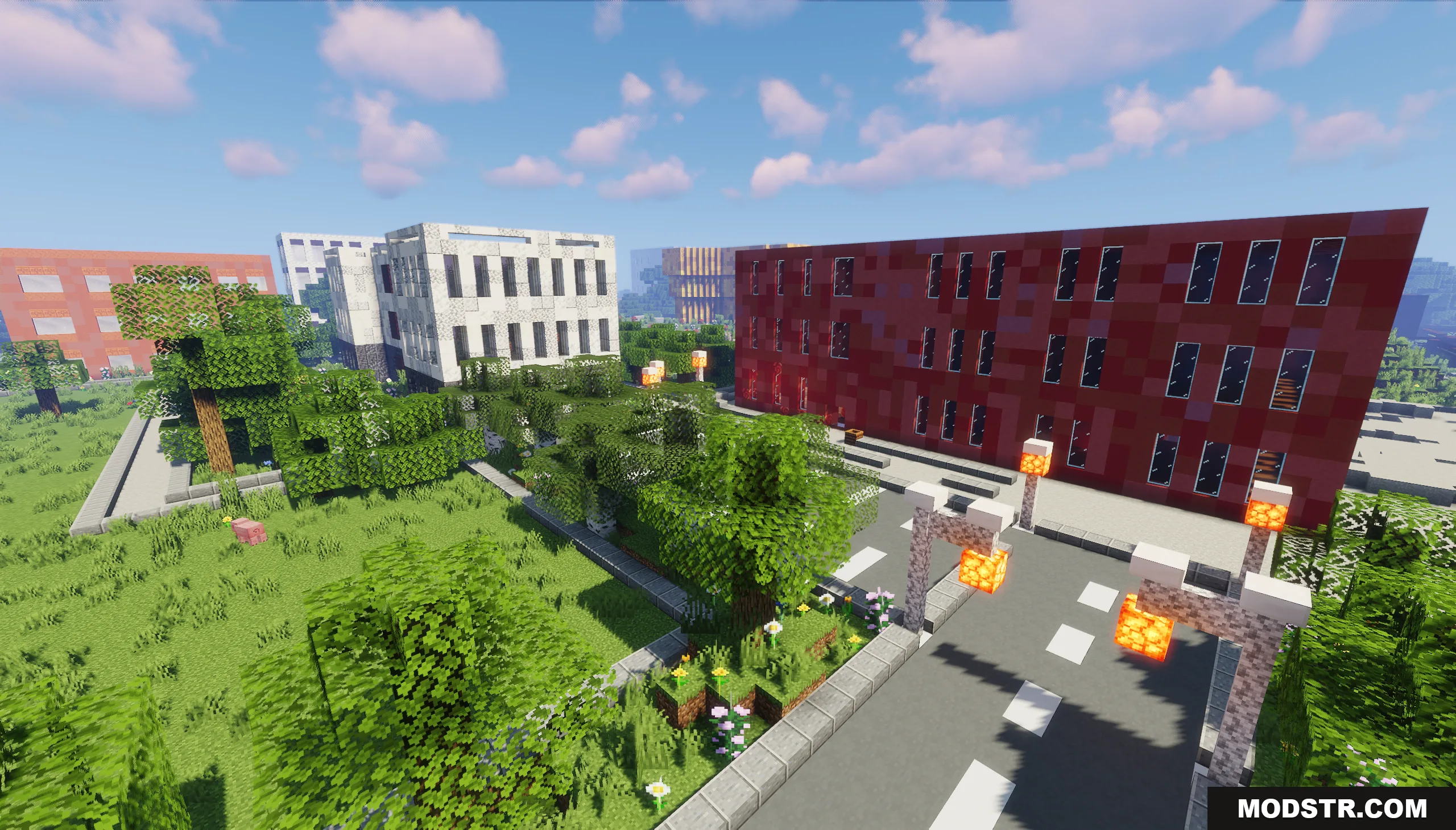 Pholon City Map Screenshot 9 A paved road with streetlights leading past trees and large modern buildings