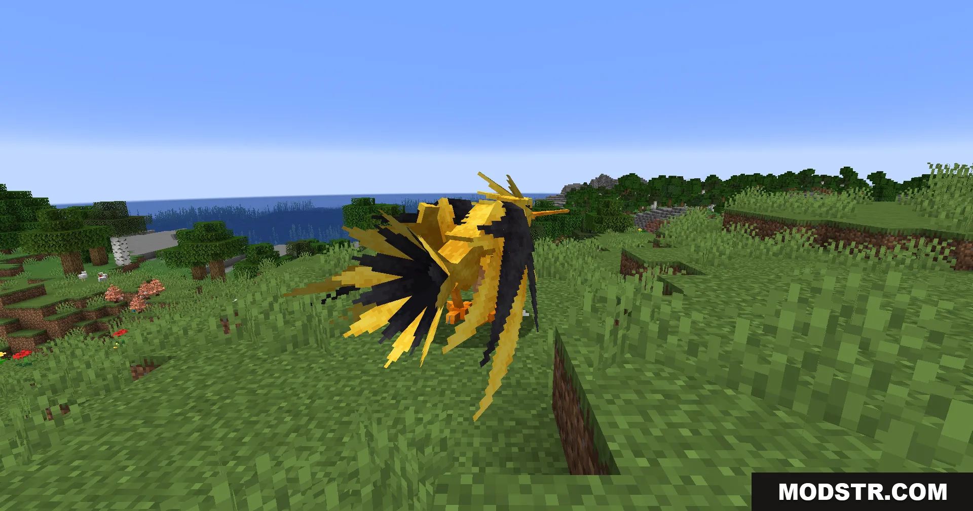 Radiant Notification Cobblemon Addon Mod Screenshot 9 A yellow legendary bird creature standing on a grassy hill near water