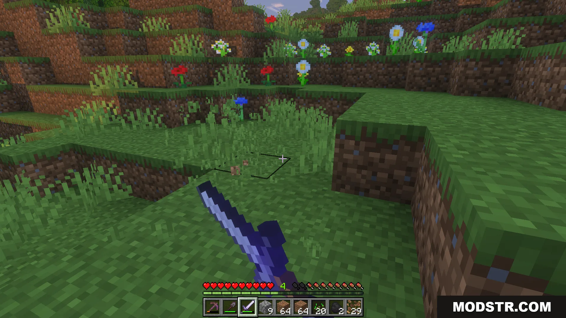 Player holding an enchanted sword while standing in a field of flowers