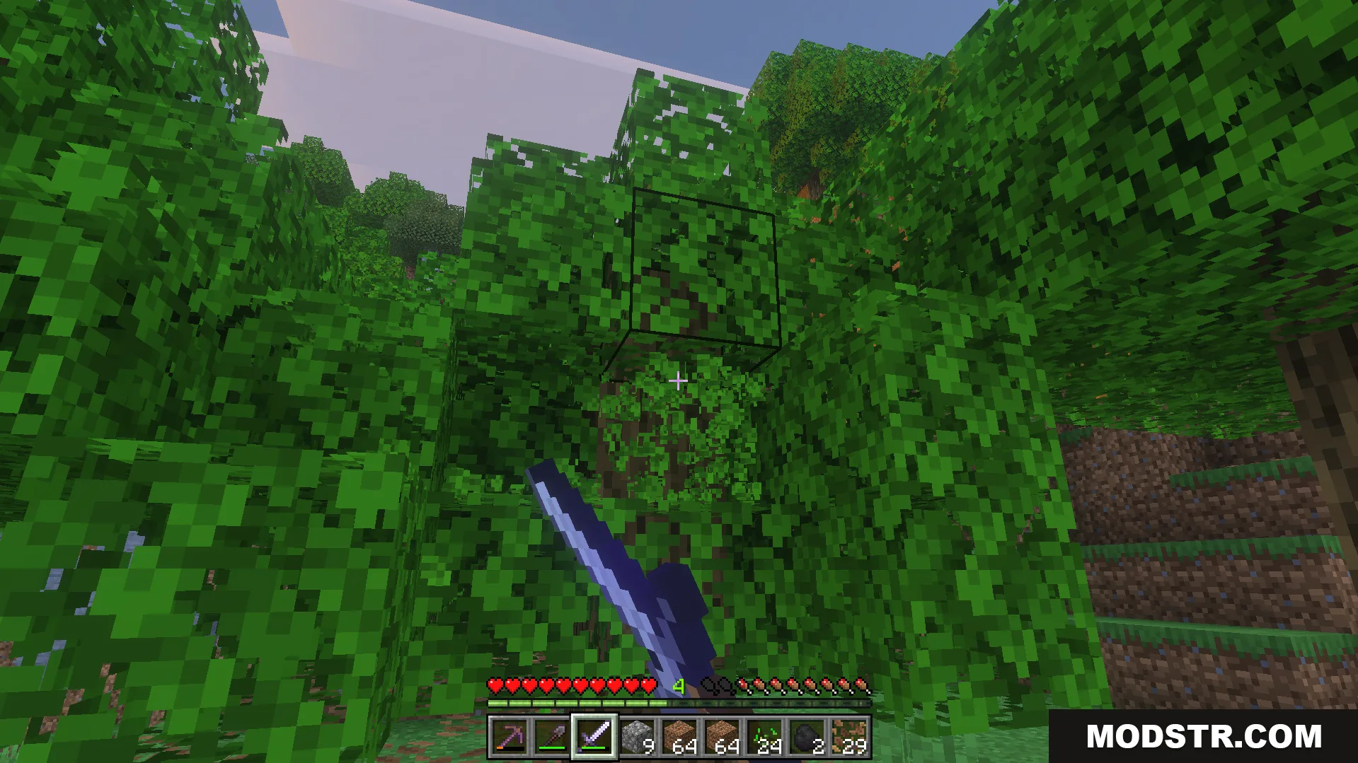 Breaking blocks in a forest to receive random enchantments on held items