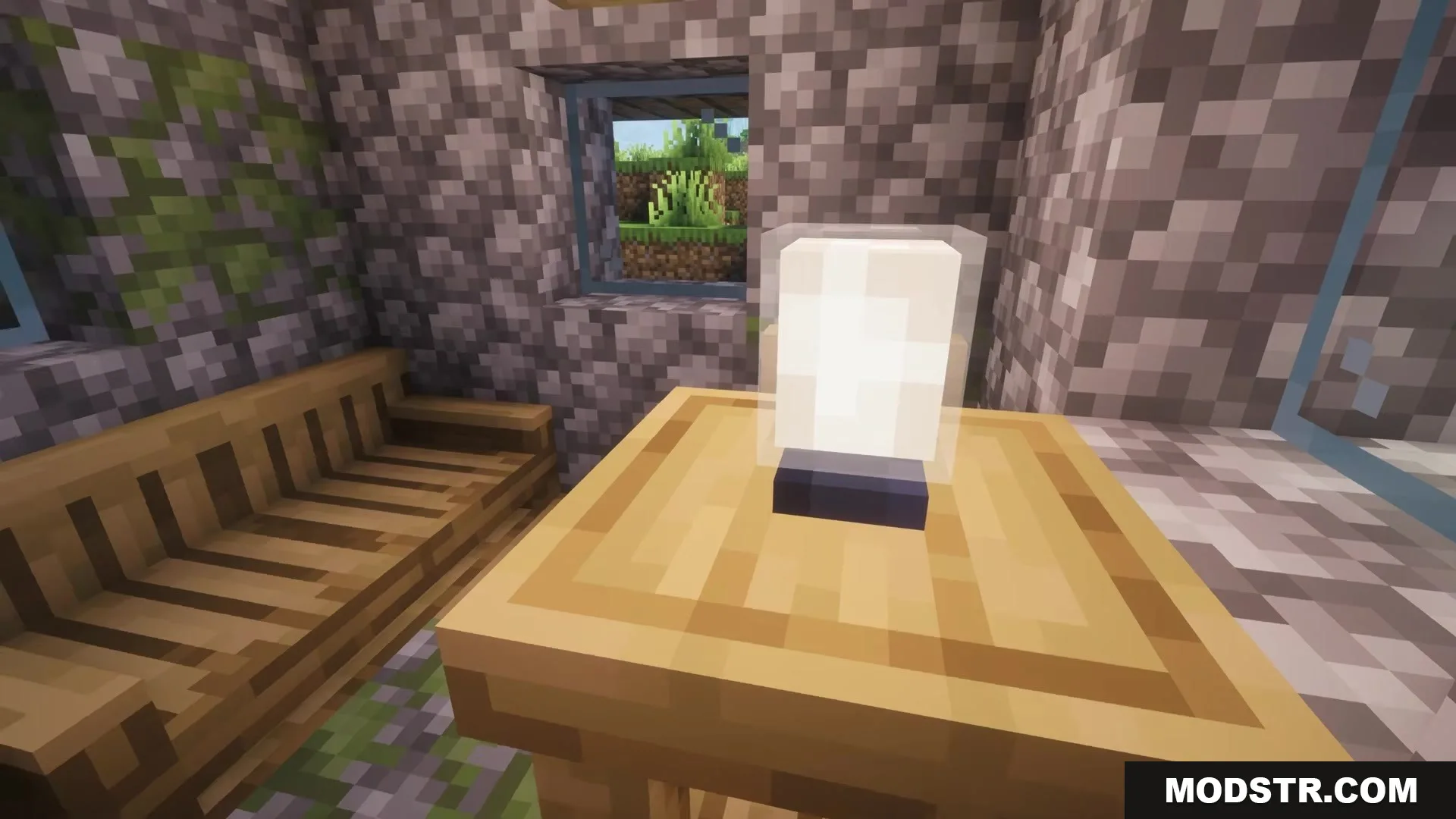 Redecorate Vanilla Furniture Mod Screenshot 1 A white lamp sits on a wooden table inside a cozy cobblestone room