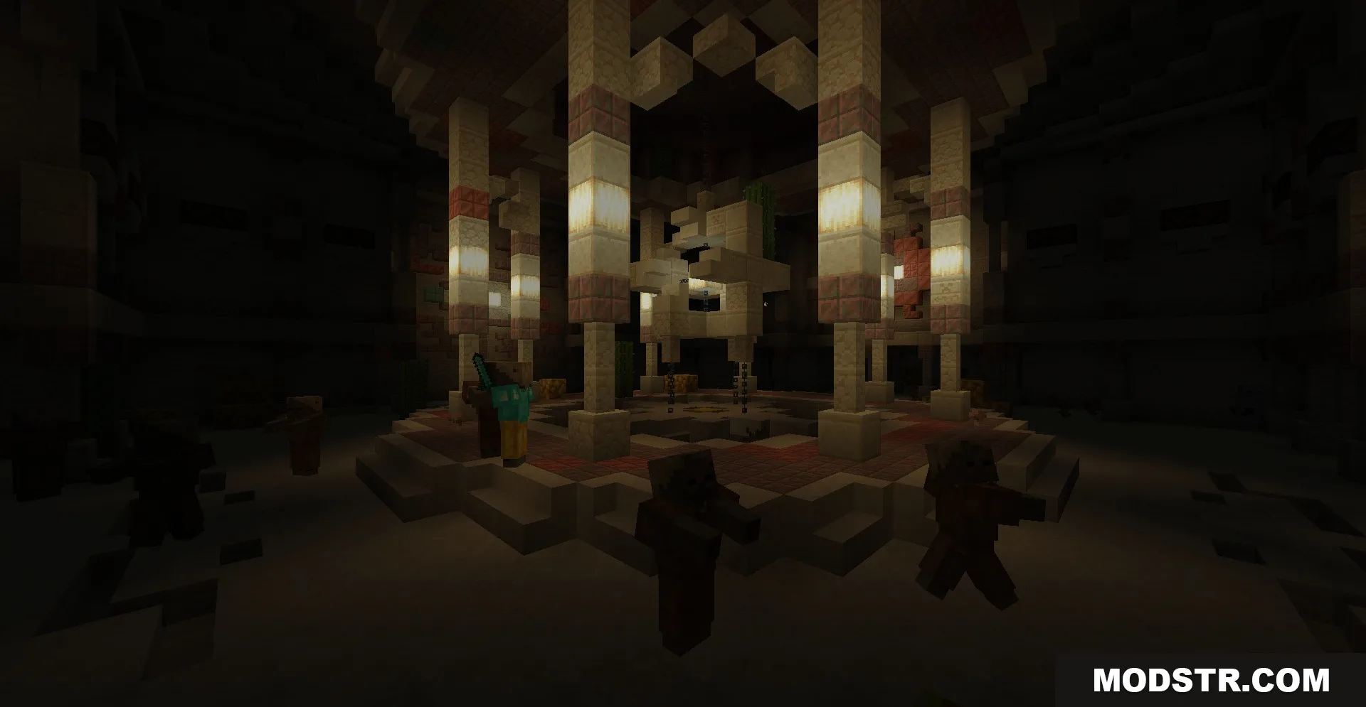The dark interior of a desert monument featuring sandstone pillars and husks