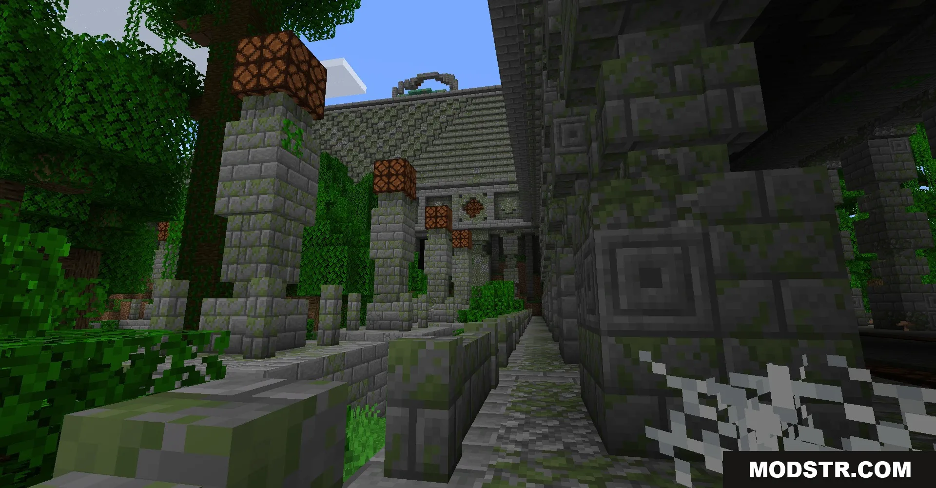 Exterior view of a jungle monument variant featuring mossy stone bricks and redstone lamps
