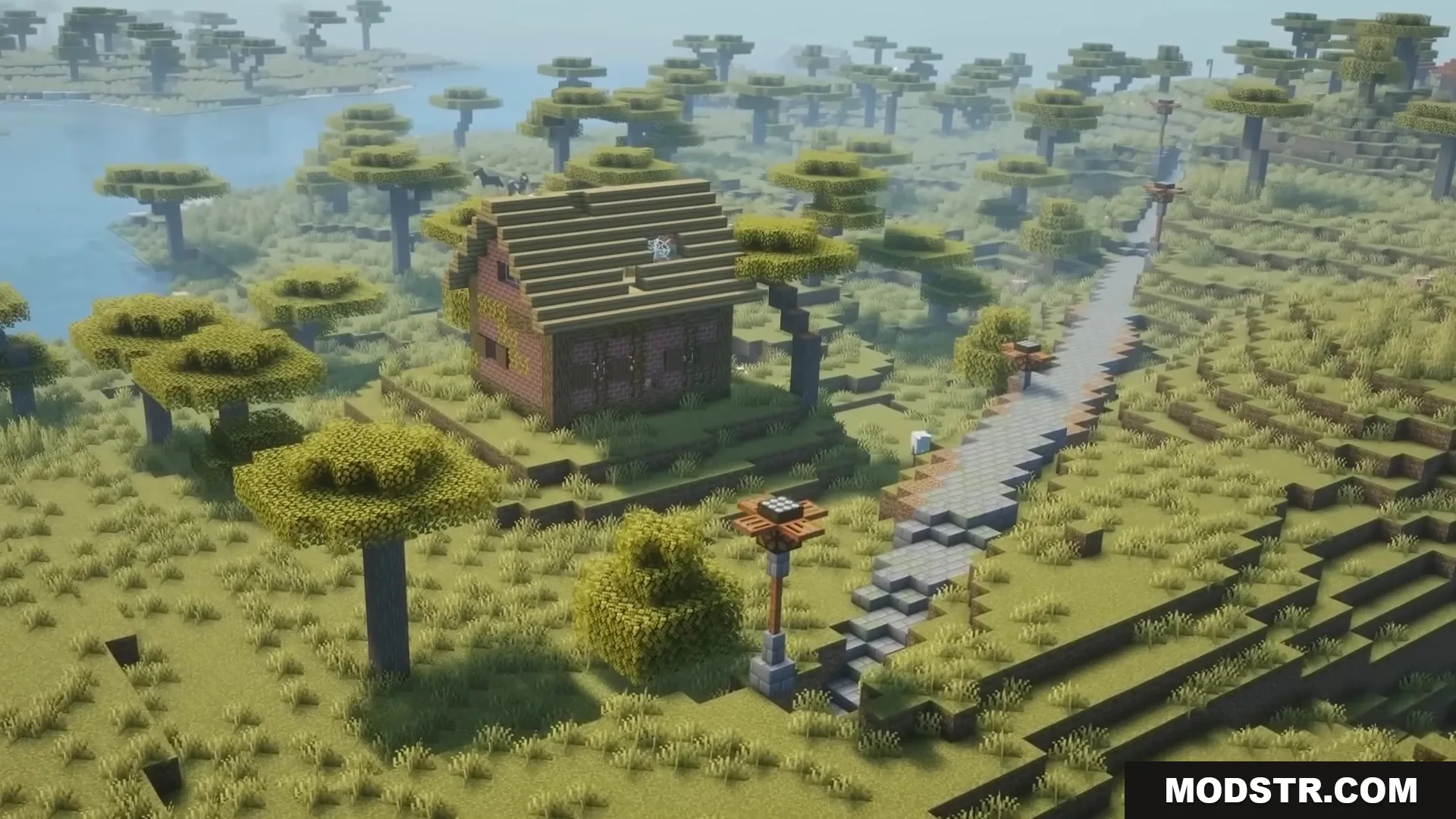Road Weaver Mod Screenshot 11 A long stone road stretches across a savanna biome near a brick house