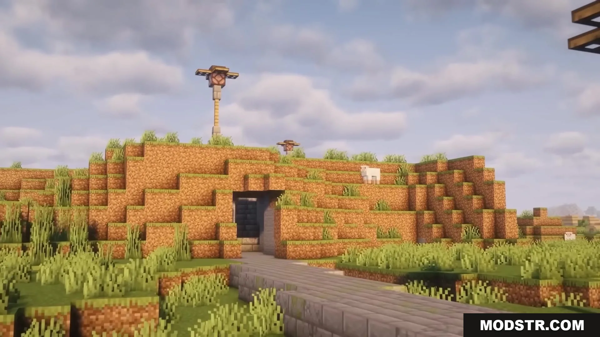 Road Weaver Mod Screenshot 7 Stone brick path leads into a tunnel through a grassy Minecraft hill