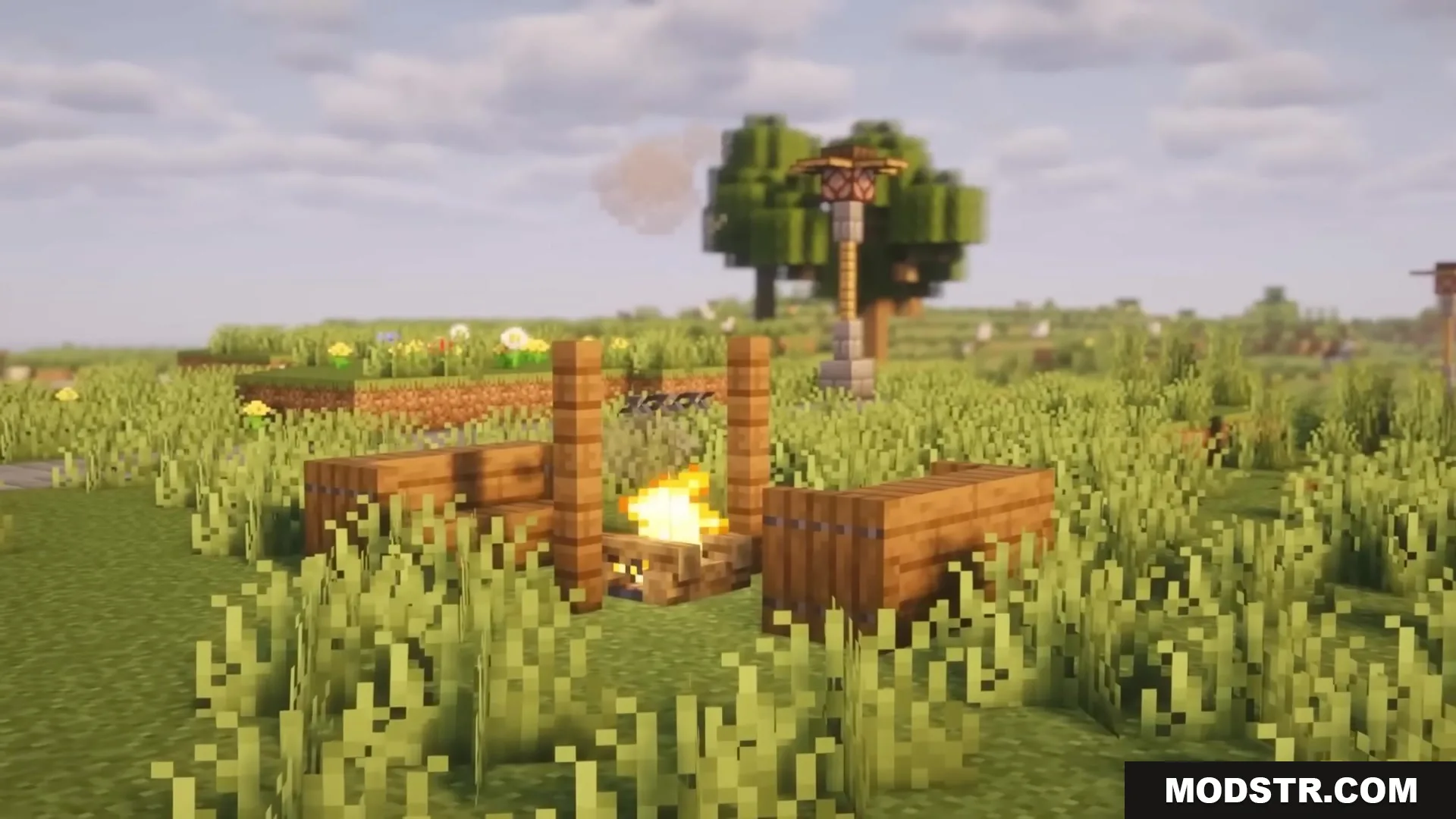 Road Weaver Mod Screenshot 5 A campfire area with wooden benches and a lamp post in a field