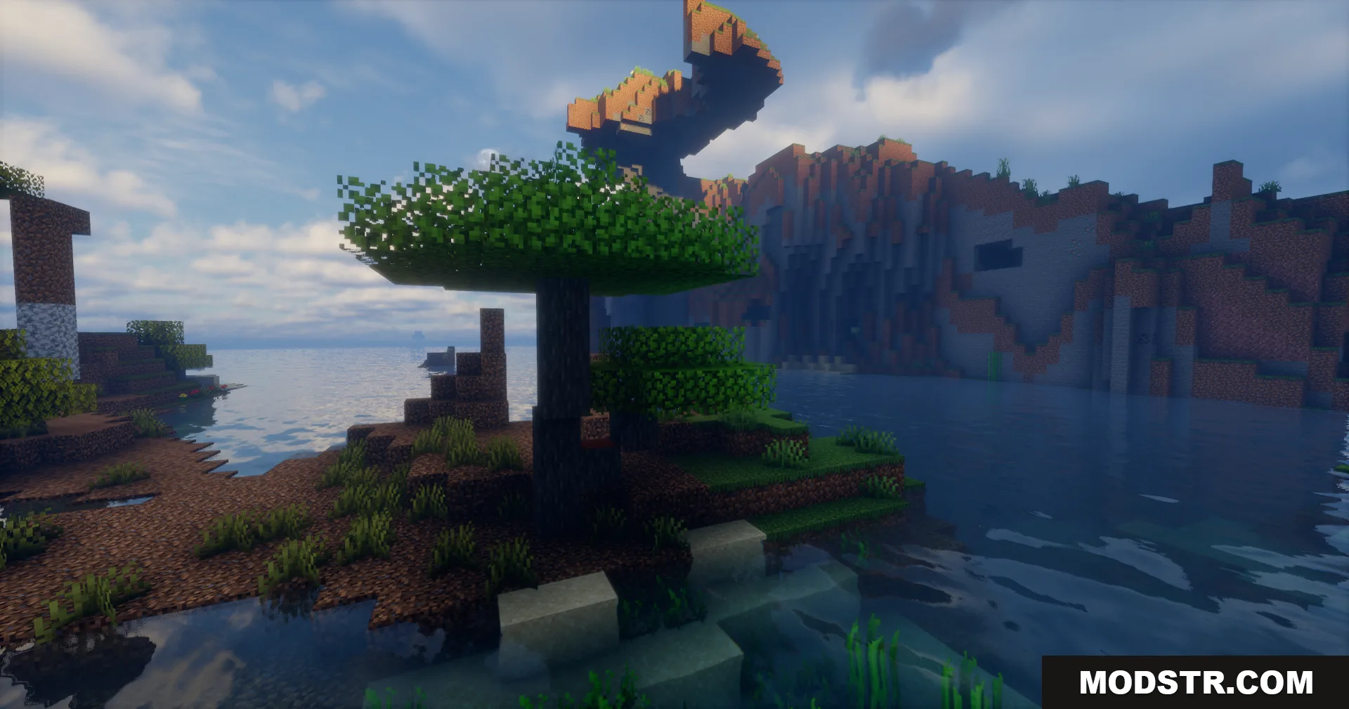 Rrtt217 S Hdr Mod Screenshot 8 A single tree stands by the water near a uniquely shaped rocky cliff