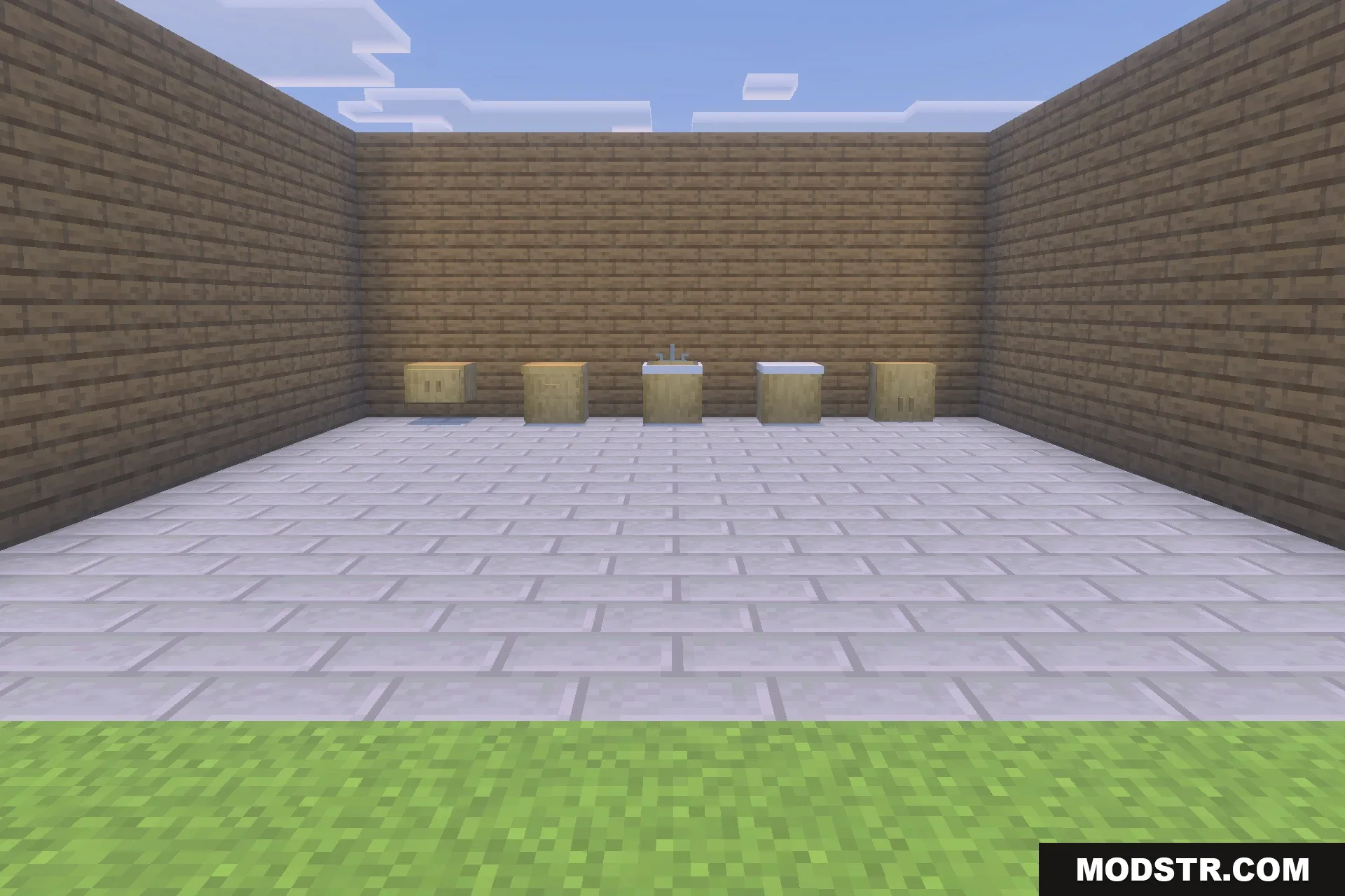Functional kitchen and bathroom fixtures arranged on a stone brick floor