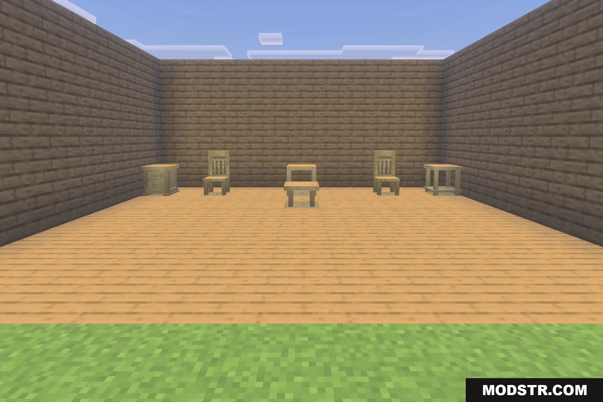 A collection of wooden chairs and tables displayed in a simple room