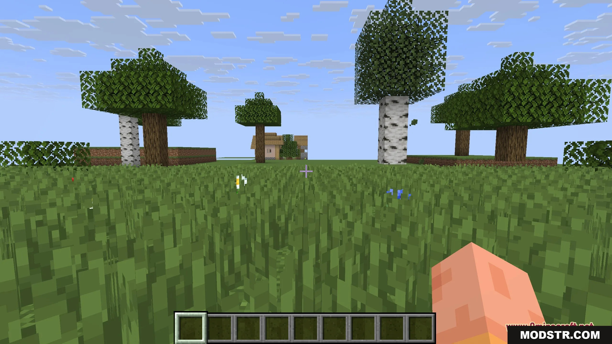 Seasons 9minecraft Mod Screenshot 5 A wall of lush green leaves and oak logs during the summer season