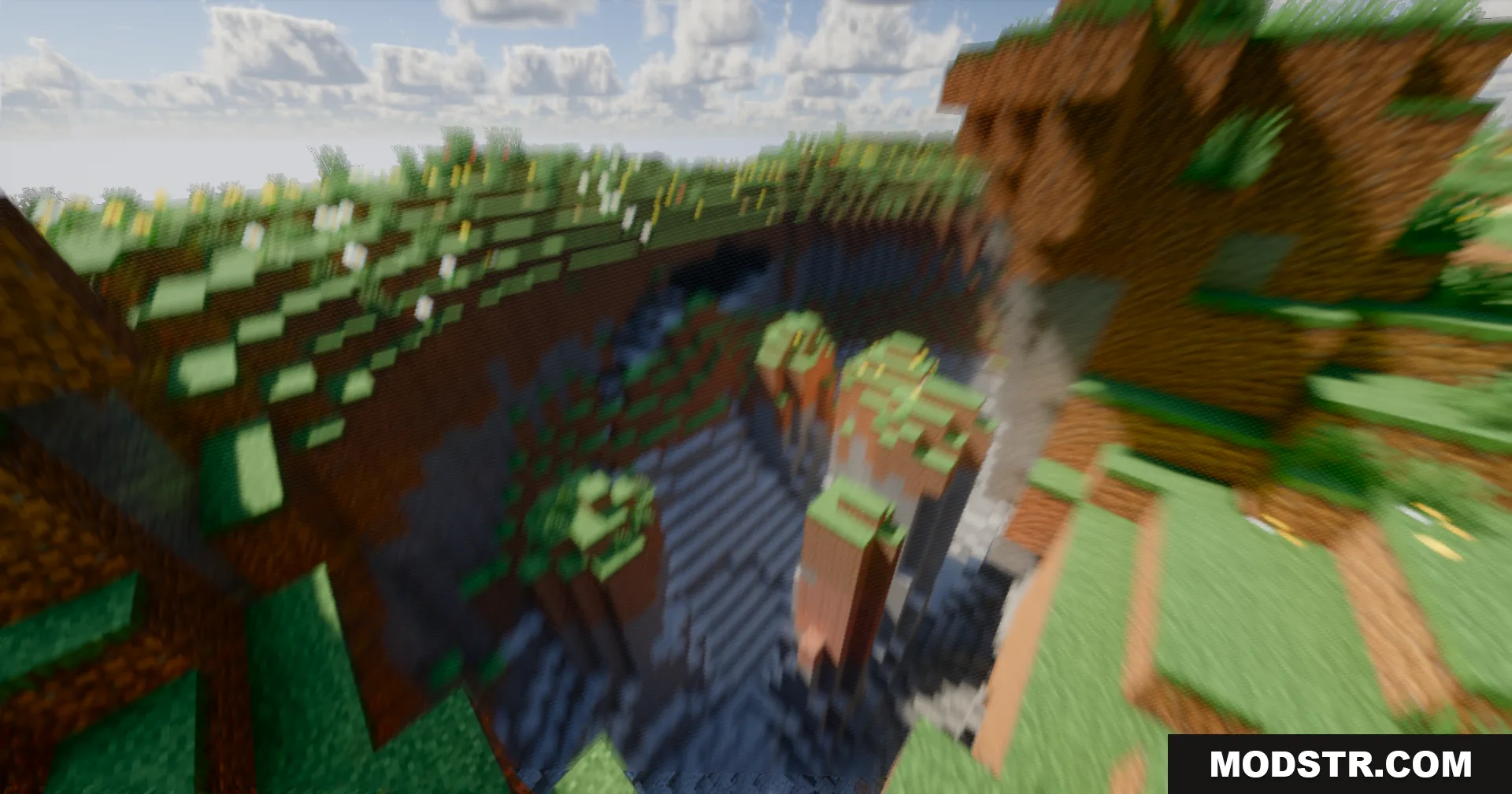 A deep Minecraft ravine viewed with a dynamic motion blur shader effect