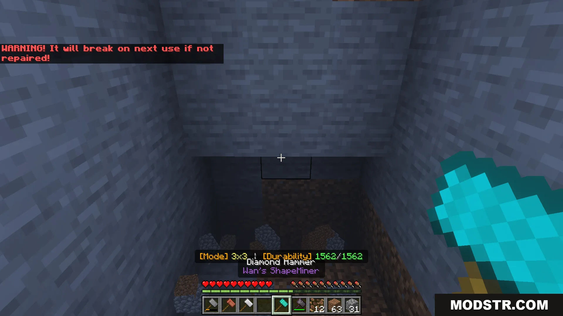 ShapeMiner Addon Screenshot 7 Player holding a diamond hammer in a stone tunnel