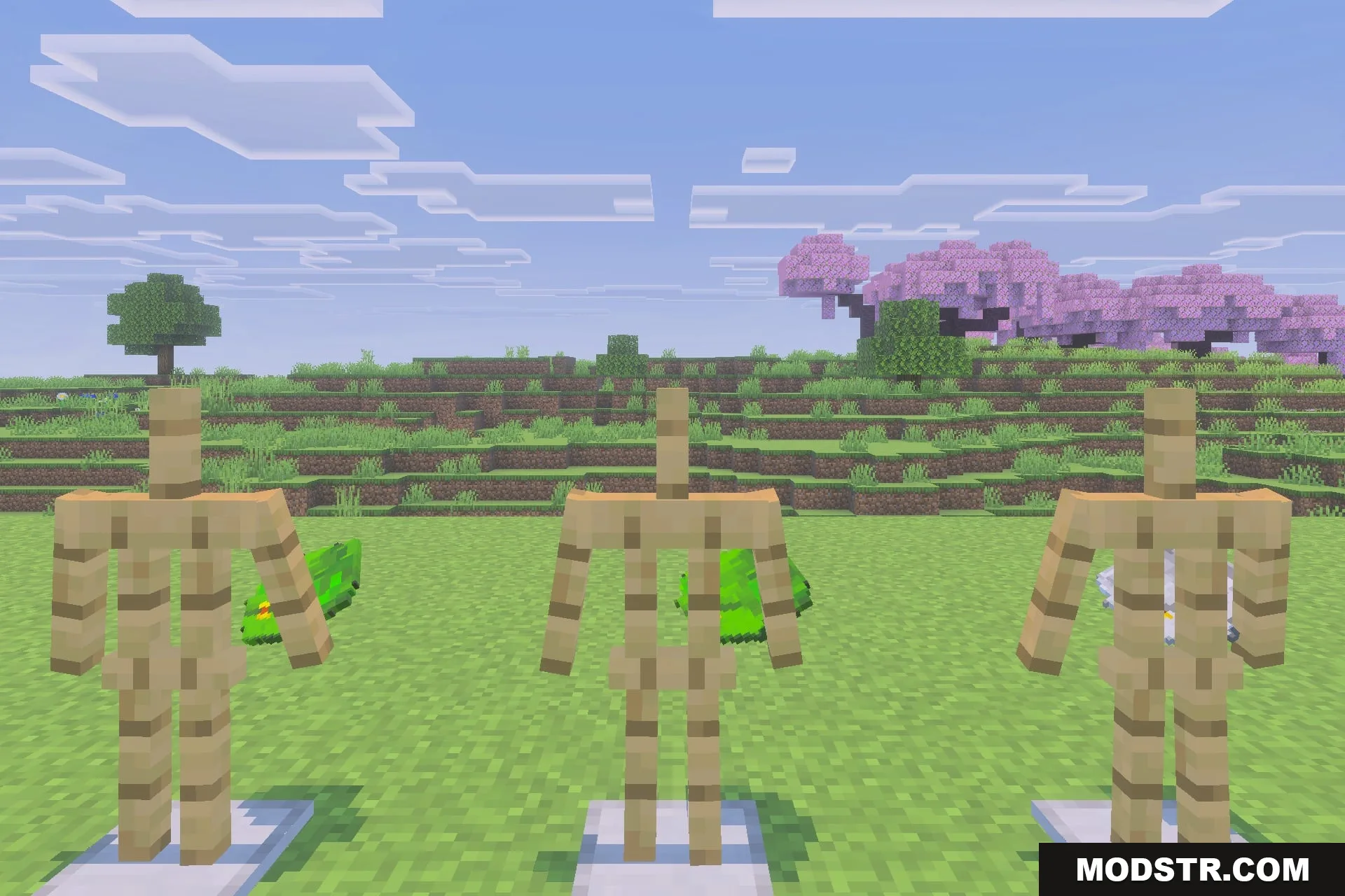Simple Backpack Achievement Friendly No Lag Addon Screenshot 2 Three armor stands showcasing various backpack designs in a wide grassy field