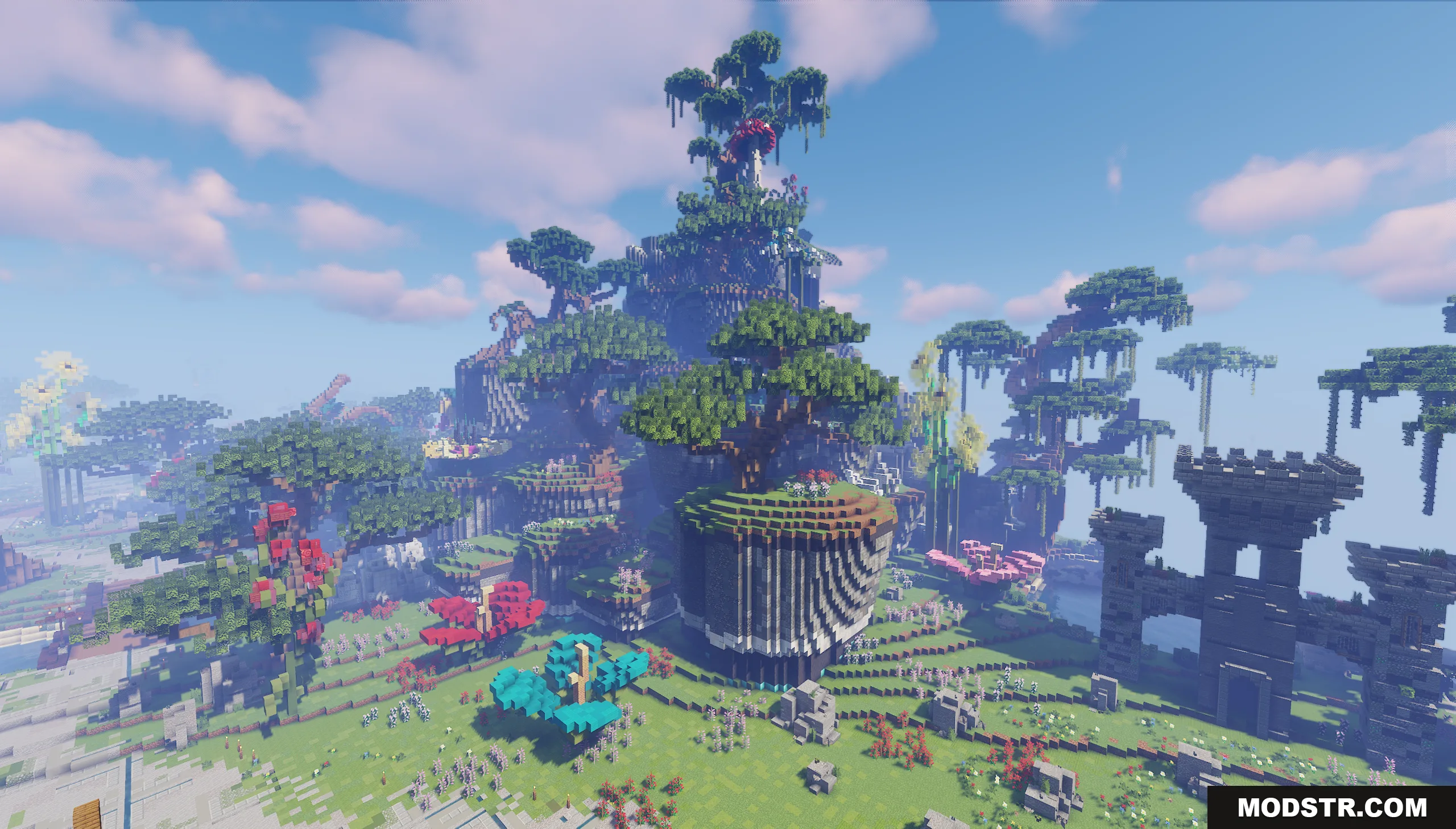 A large custom tree on a stone platform overlooks a ruined castle structure
