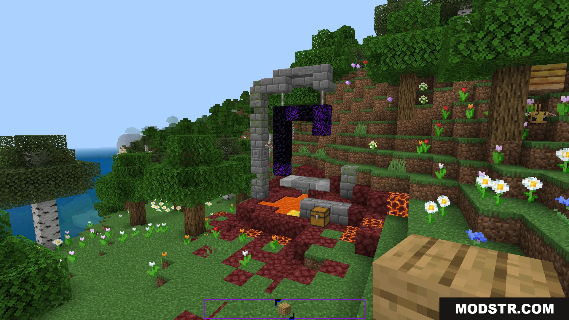 Minecraft Bedrock ruined portal structure in a grassy biome