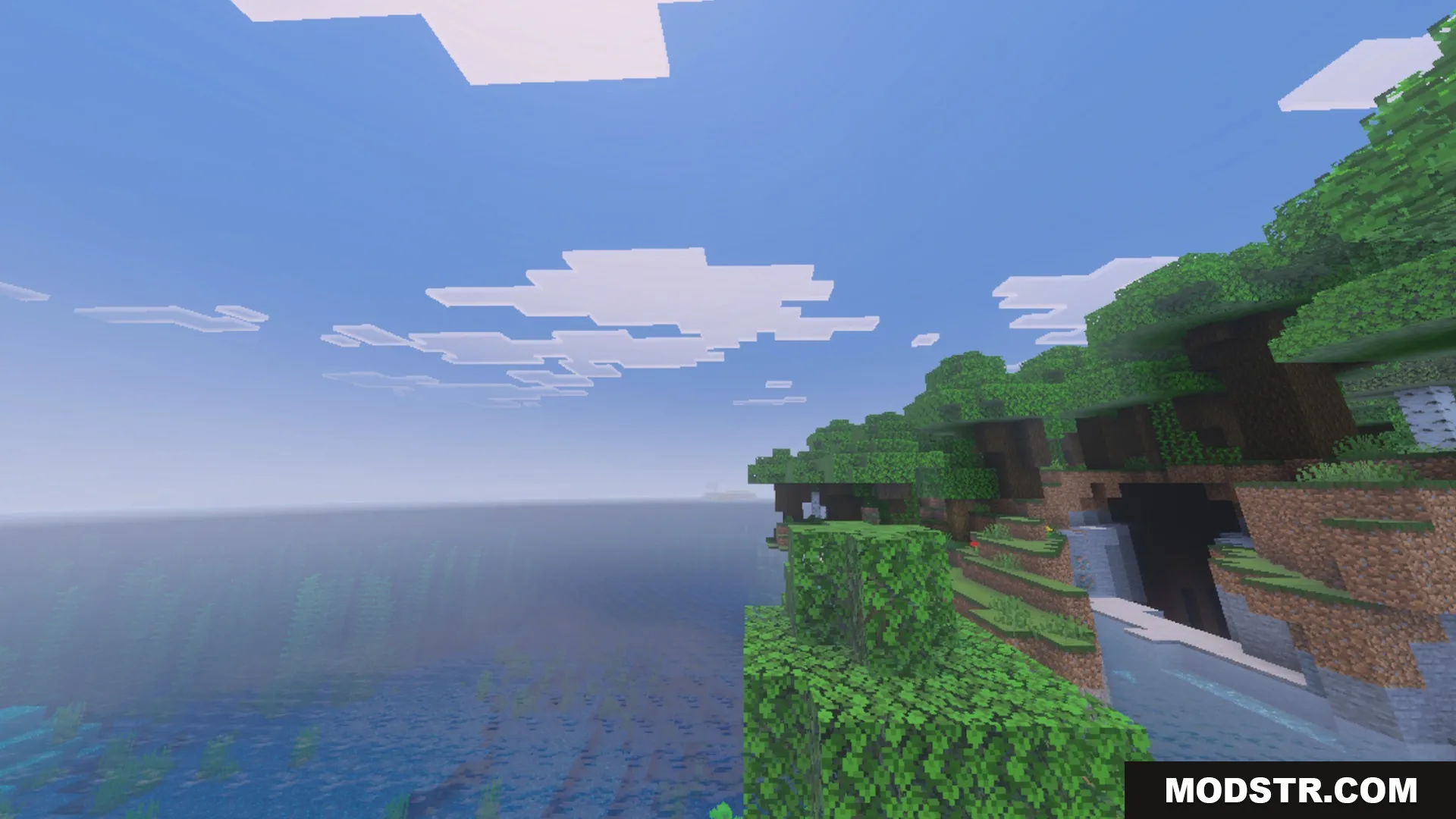 Spectral Horizons Shader Screenshot 1 Bright and colorful coastal scenery with lush green trees and blue water
