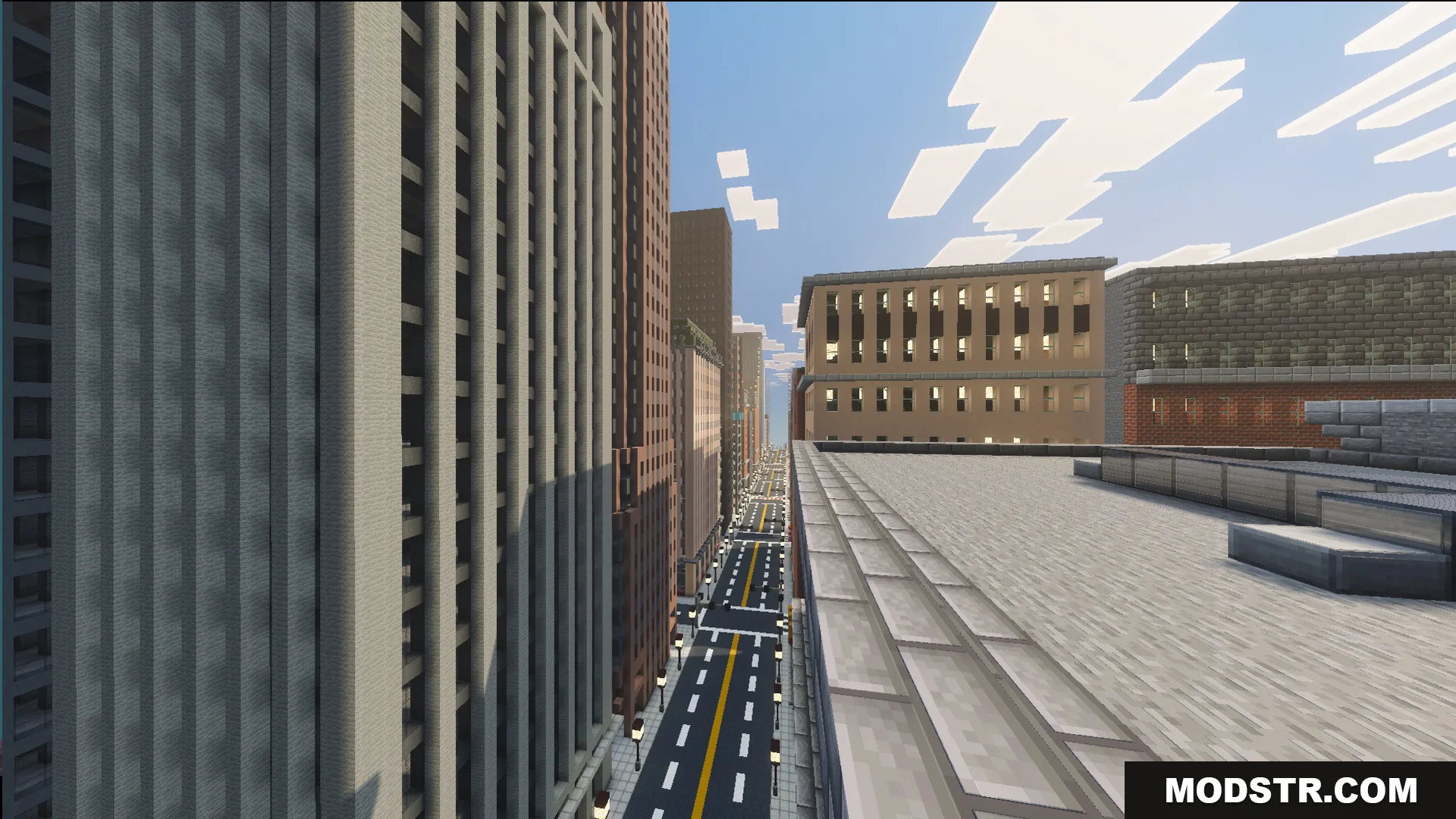 SpiderMan City Map Screenshot 9 View from a rooftop overlooking tall skyscrapers and a long city road