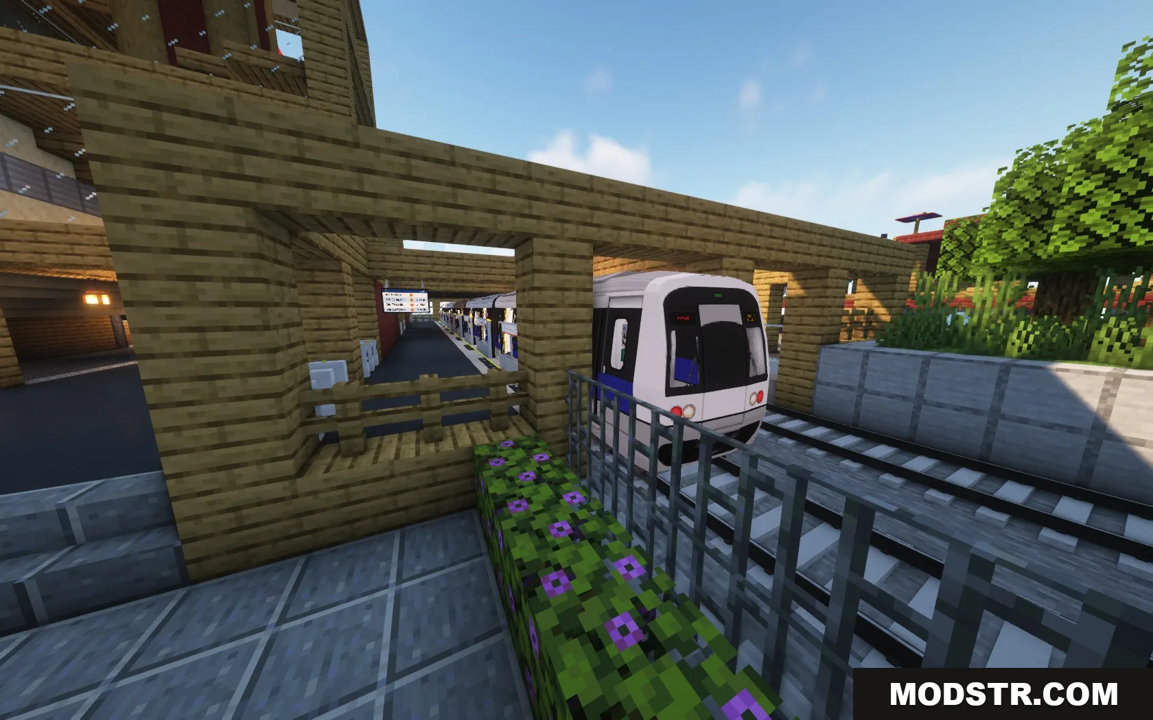 Steel Transit Blueprints Resource Pack Screenshot 1 A white and blue STB Metro train pulls into a wooden station platform