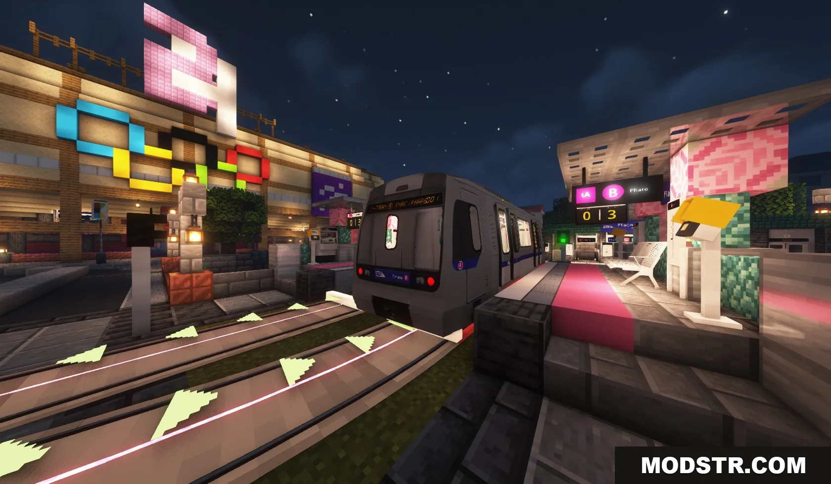 Steel Transit Blueprints Resource Pack Screenshot 8 A modern train arrives at a brightly lit outdoor station at night